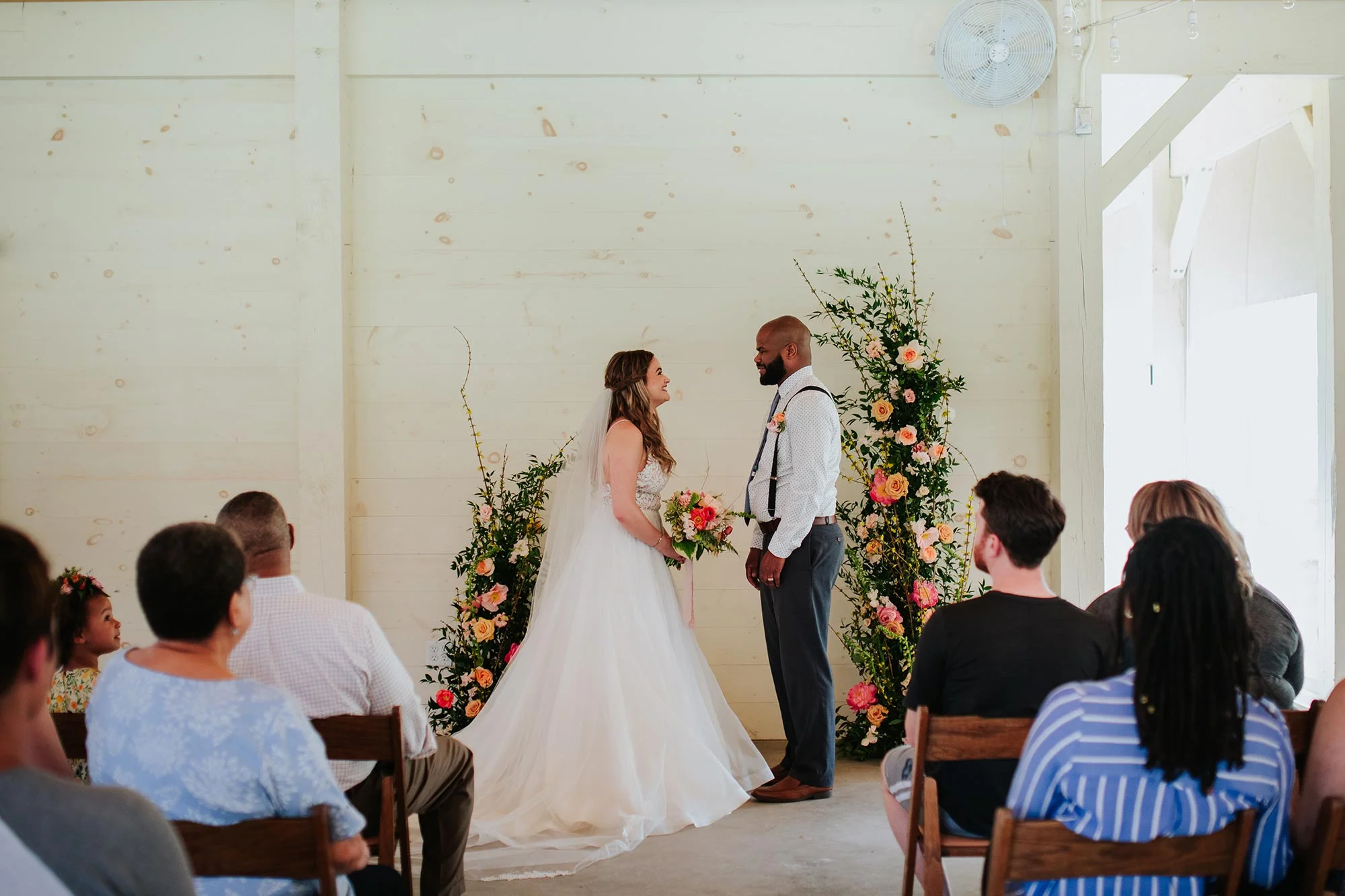 Lush wedding inspiration at Seven Springs VA with bride and groom during ceremony Carly Romeo & Co.