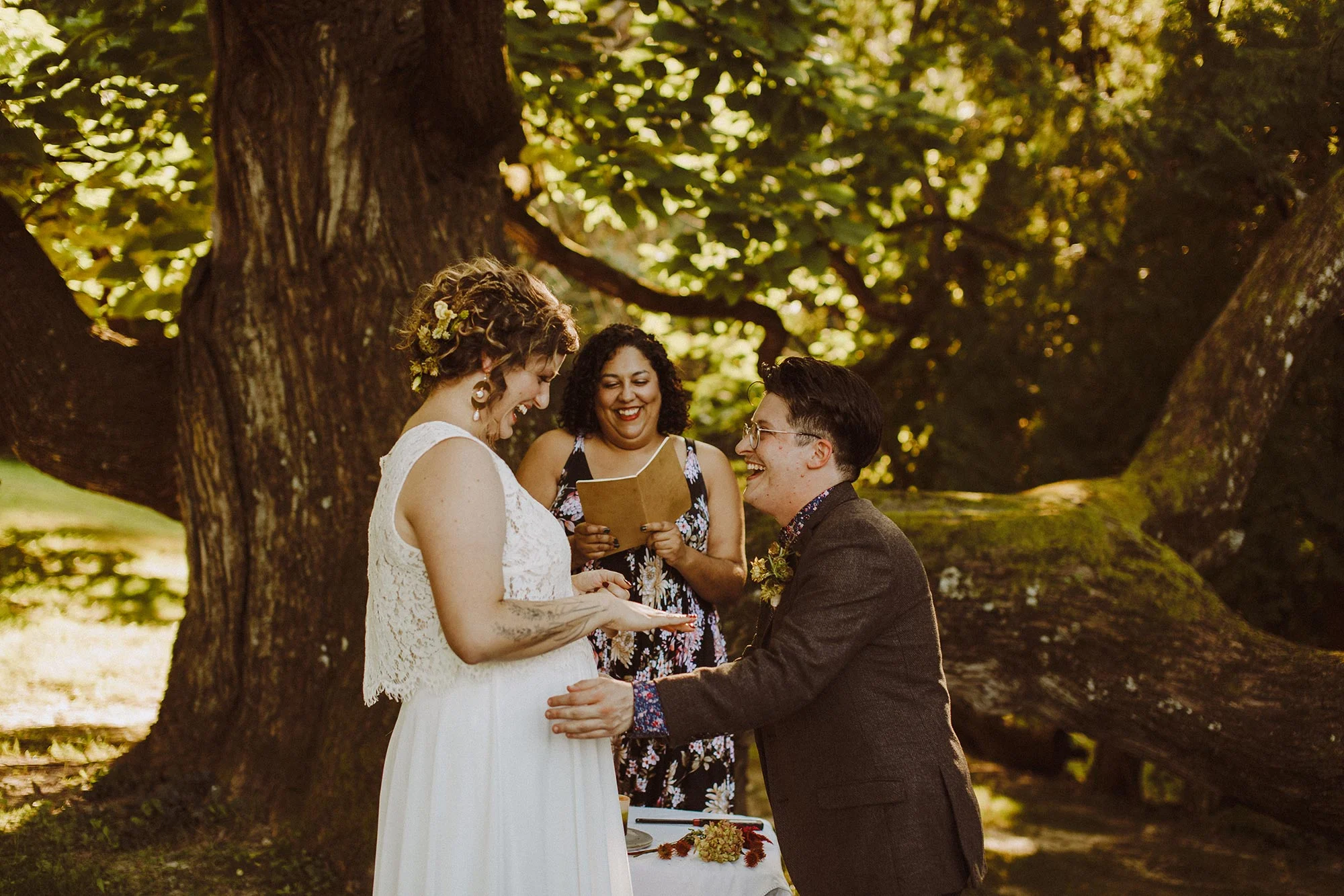 DIY summer camp wedding spring green wisconsin heidi uhlman photography exchanging rings