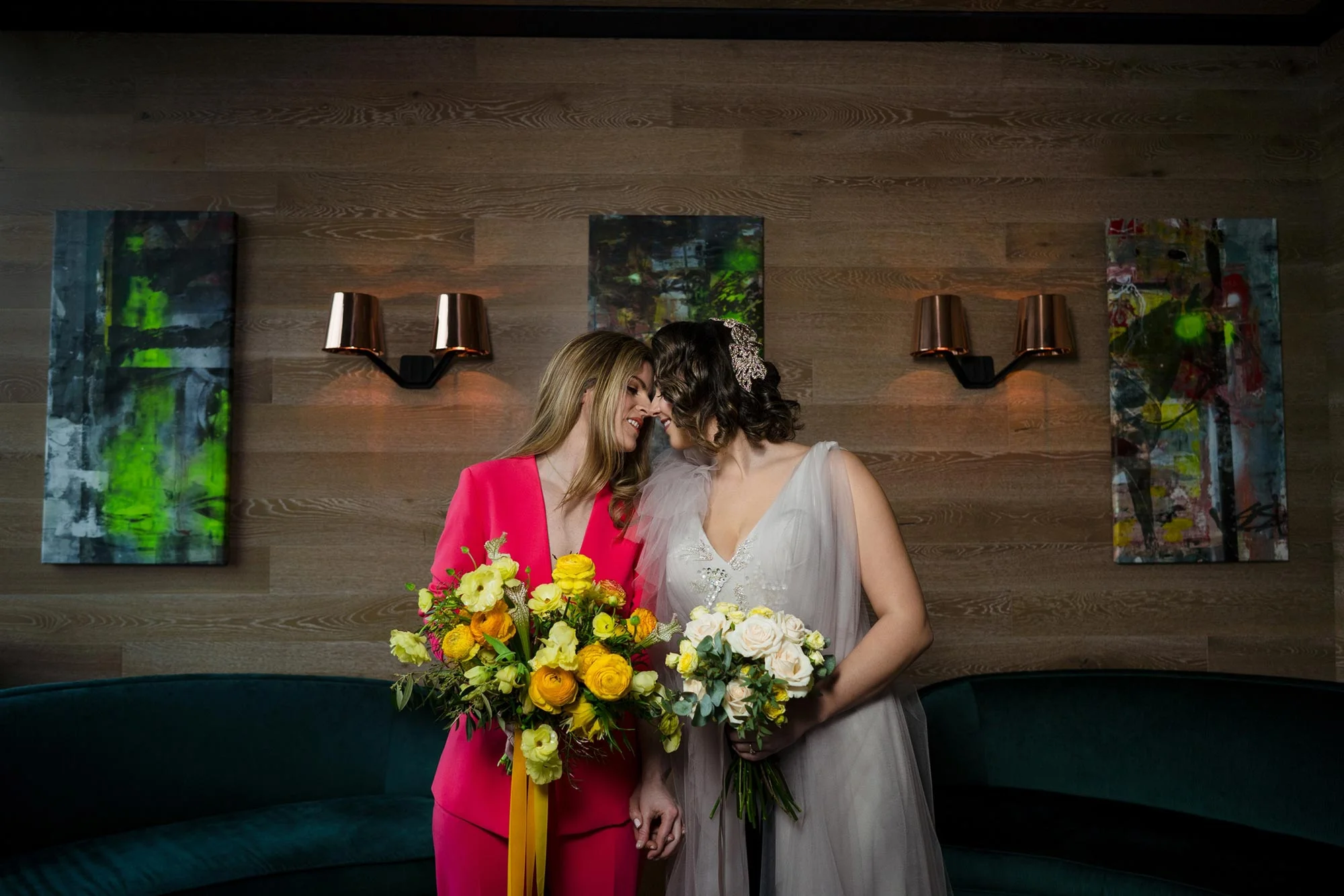 Bright Neon Wedding Inspiration at The Bowery Hotel NYC showing couple leaning in for kiss JC Lemon Photography