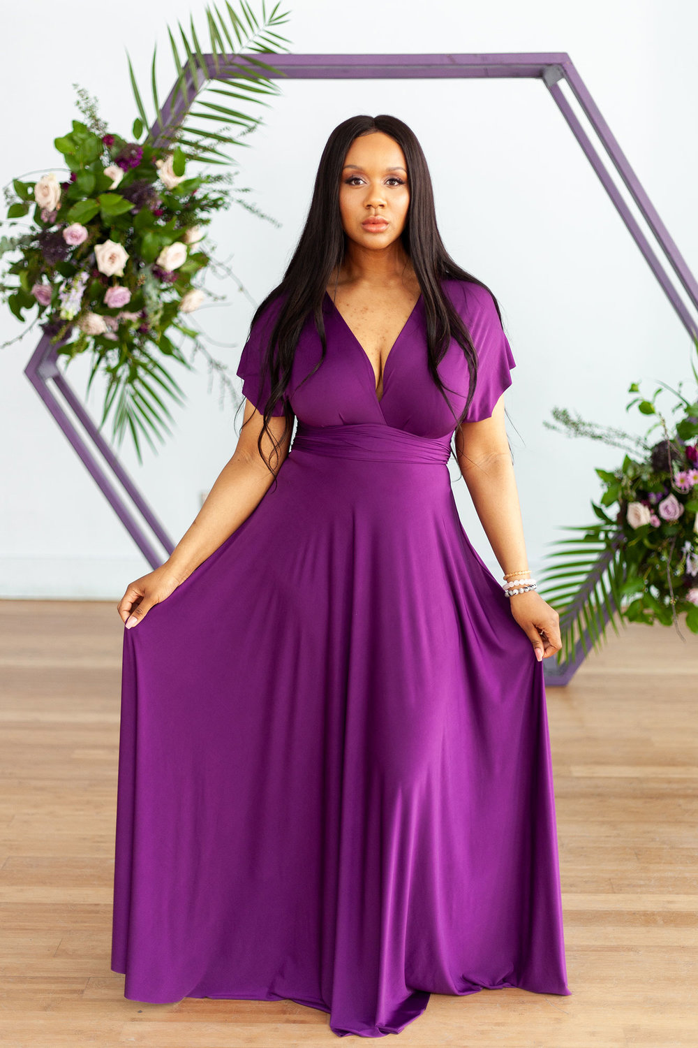 Henkaa fall wedding collection with bridesmaid in plum purple dress