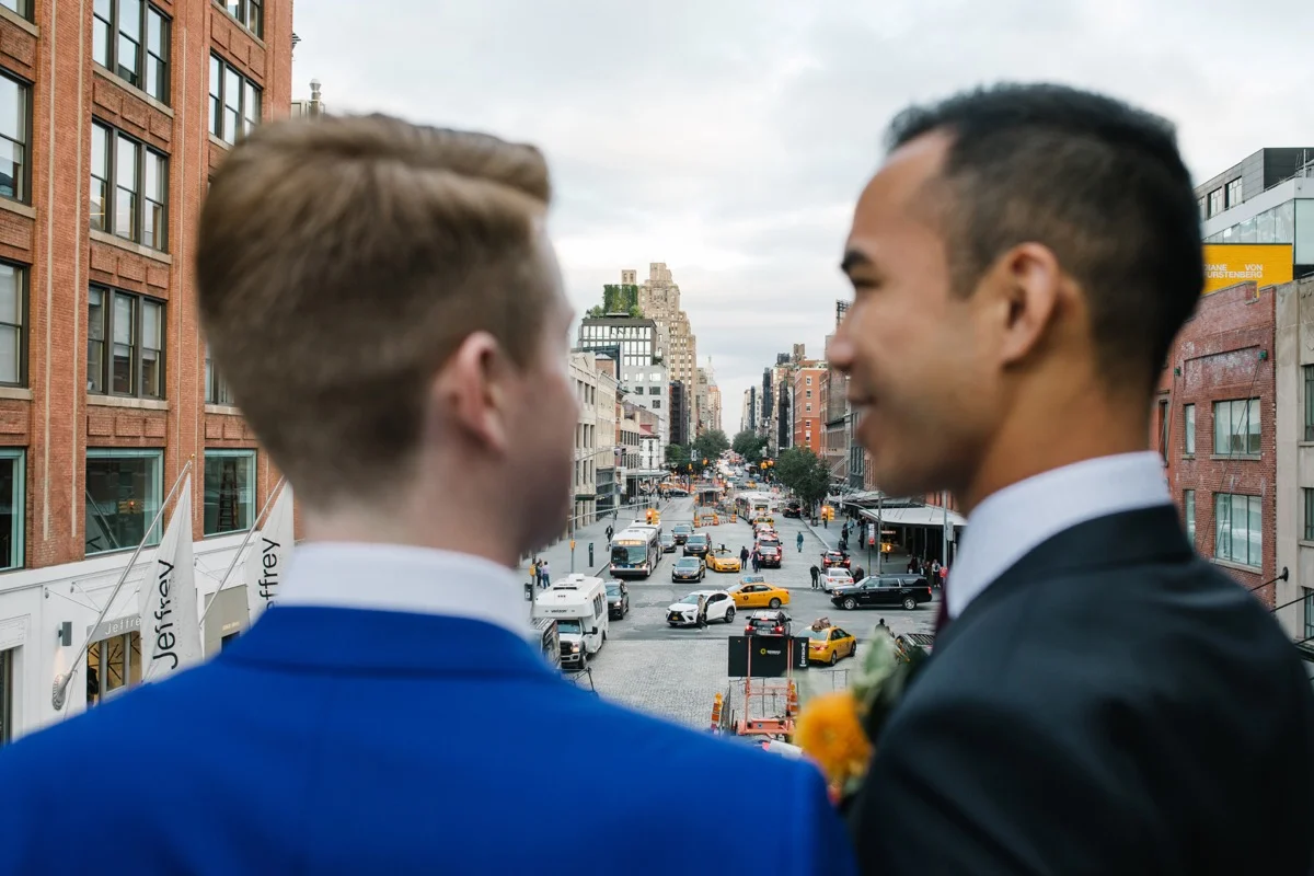 modern mediterranean wedding meatpacking district new york city rima brindamour photography grooms overlooking city