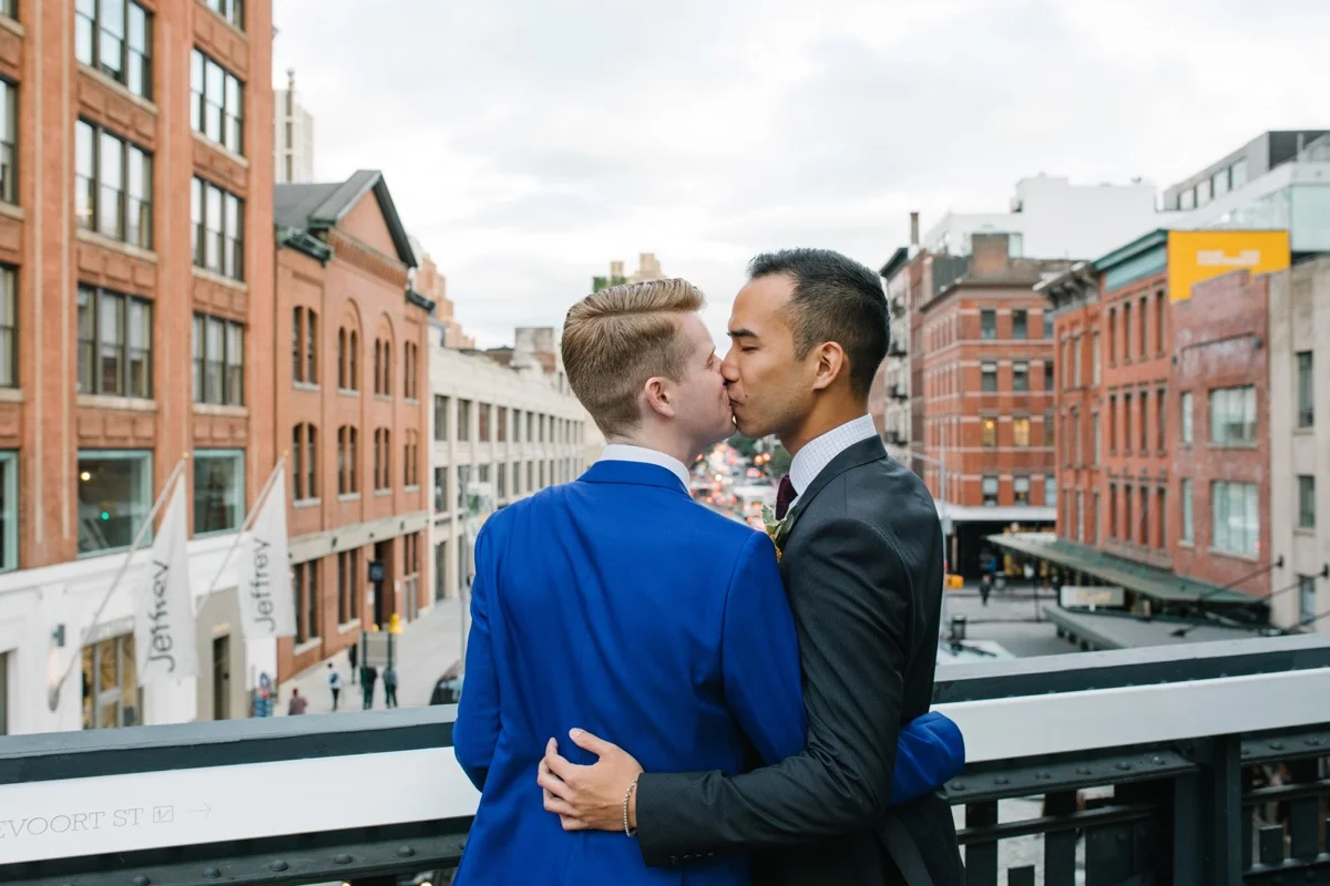modern mediterranean wedding meatpacking district new york city rima brindamour photography kiss on balcony