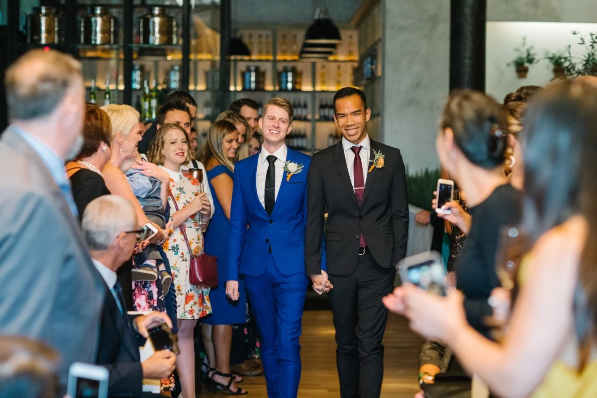 modern mediterranean wedding meatpacking district new york city rima brindamour photography grooms entering ceremony