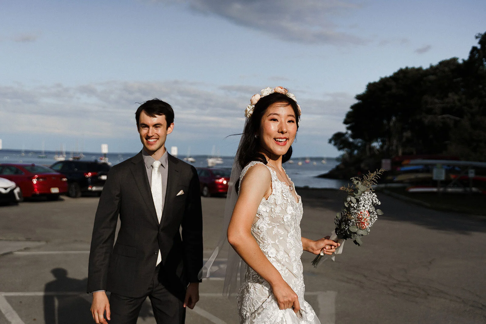 Newlywed couple smile in parking lot after ceremony Rachel Epperly Film and Photo Portland Oregon