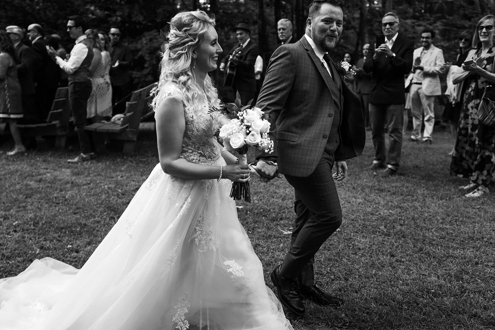 Newlywed walk hand in hand through the trees Rachel Epperly Film and Photo Portland Oregon