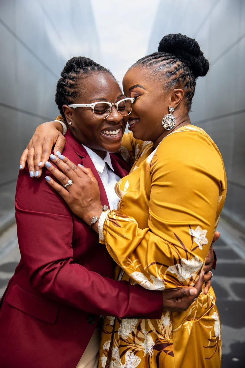 engaged couple smiles during photo session in NYC DAG Images