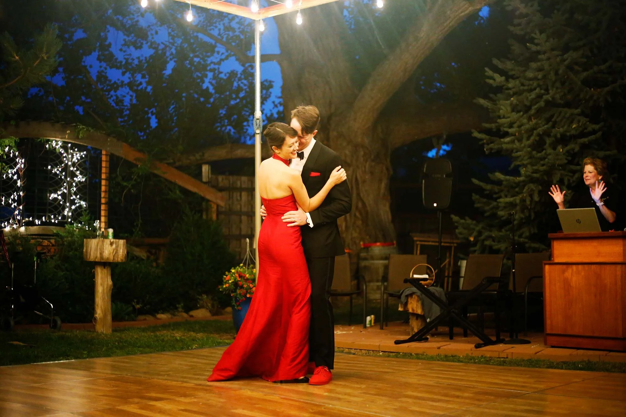Cathy wearing a variation of a qipao at her wedding in New York during first dance with partner Leslie Rodriguez Photography