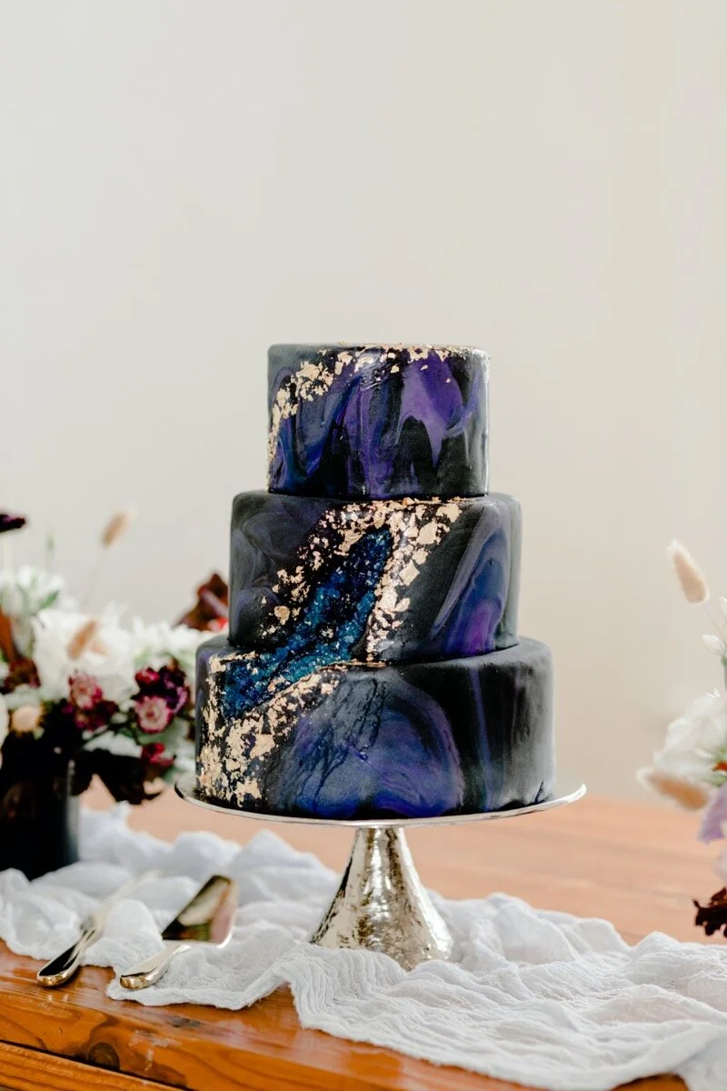 Celestial and Geode wedding inspiration in Winston Salem NC showing geode blue and gold wedding cake on reception table Ariel Kaitlin Photography