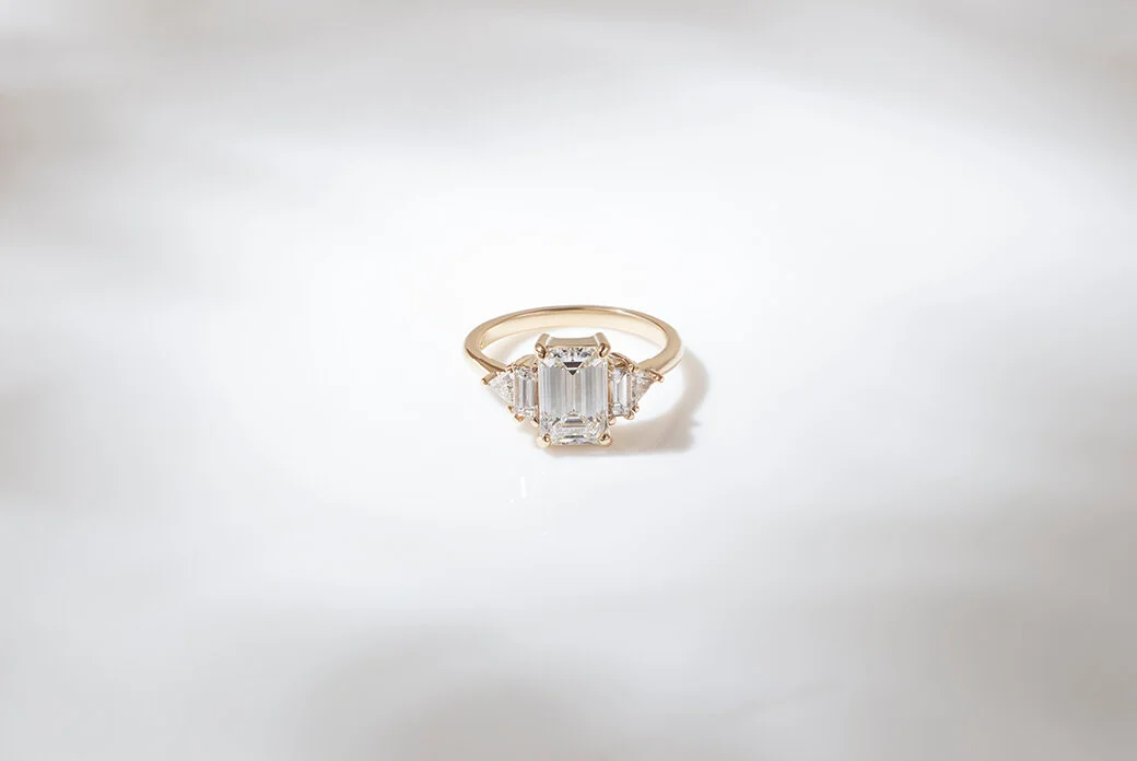 Emerald Cut White Sapphire Cluster Engagement Ring