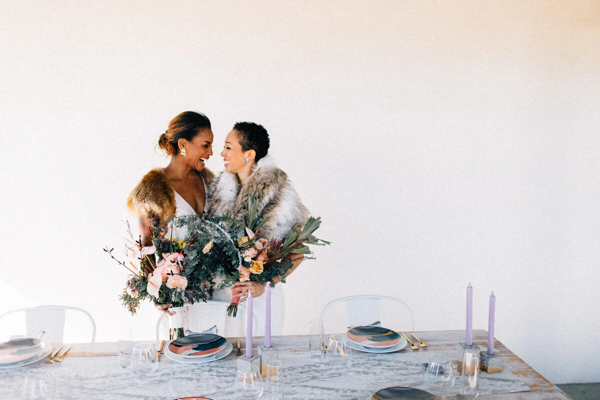 LGBTQ+ couple smiles after wedding ceremony in Palm Springs Fuck Yeah Weddings