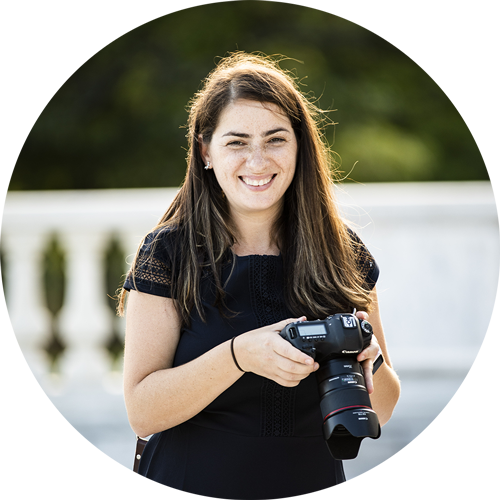 Amy Tannenbaum of Amy Ann Photo holding camera
