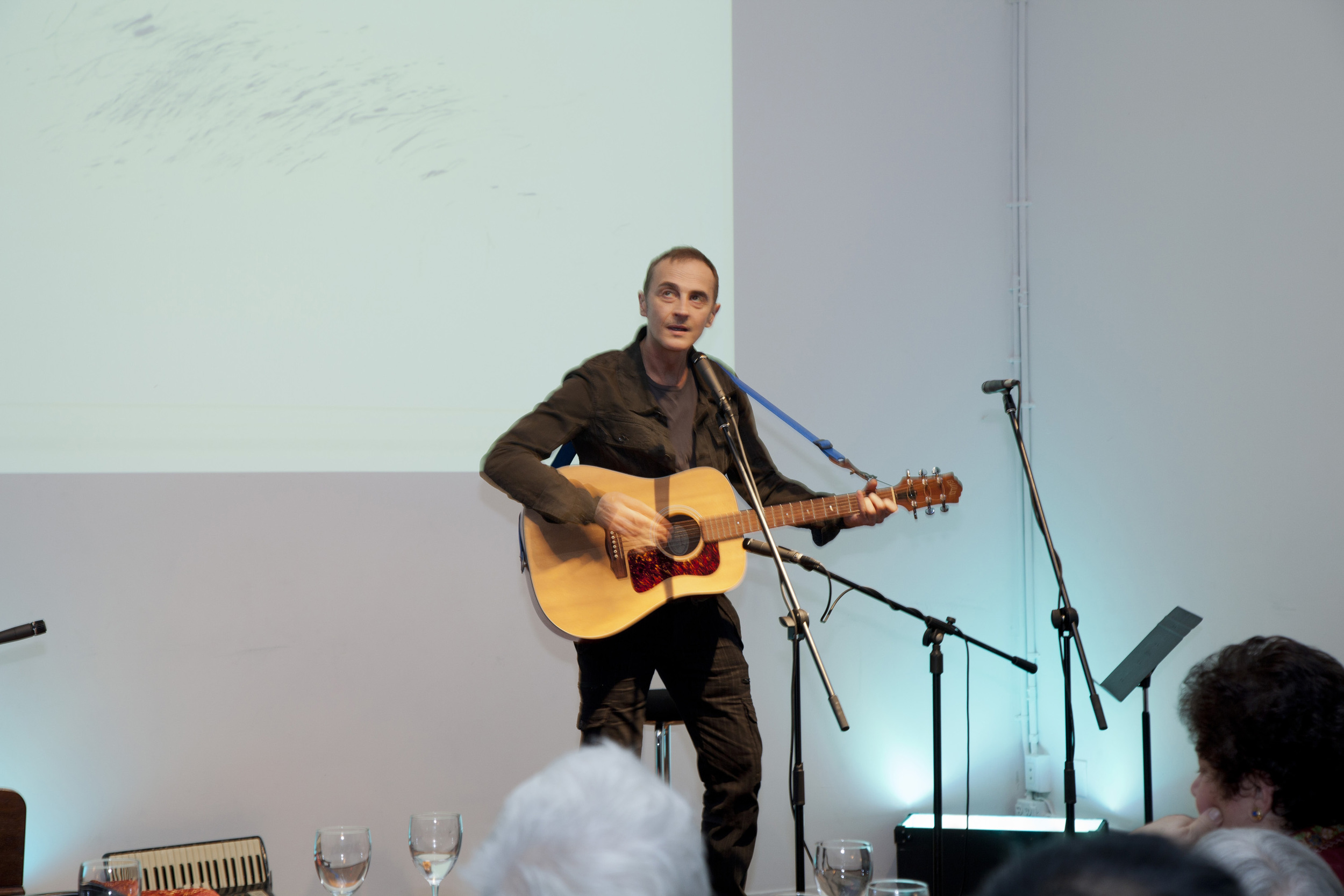 John Kelly performing a song