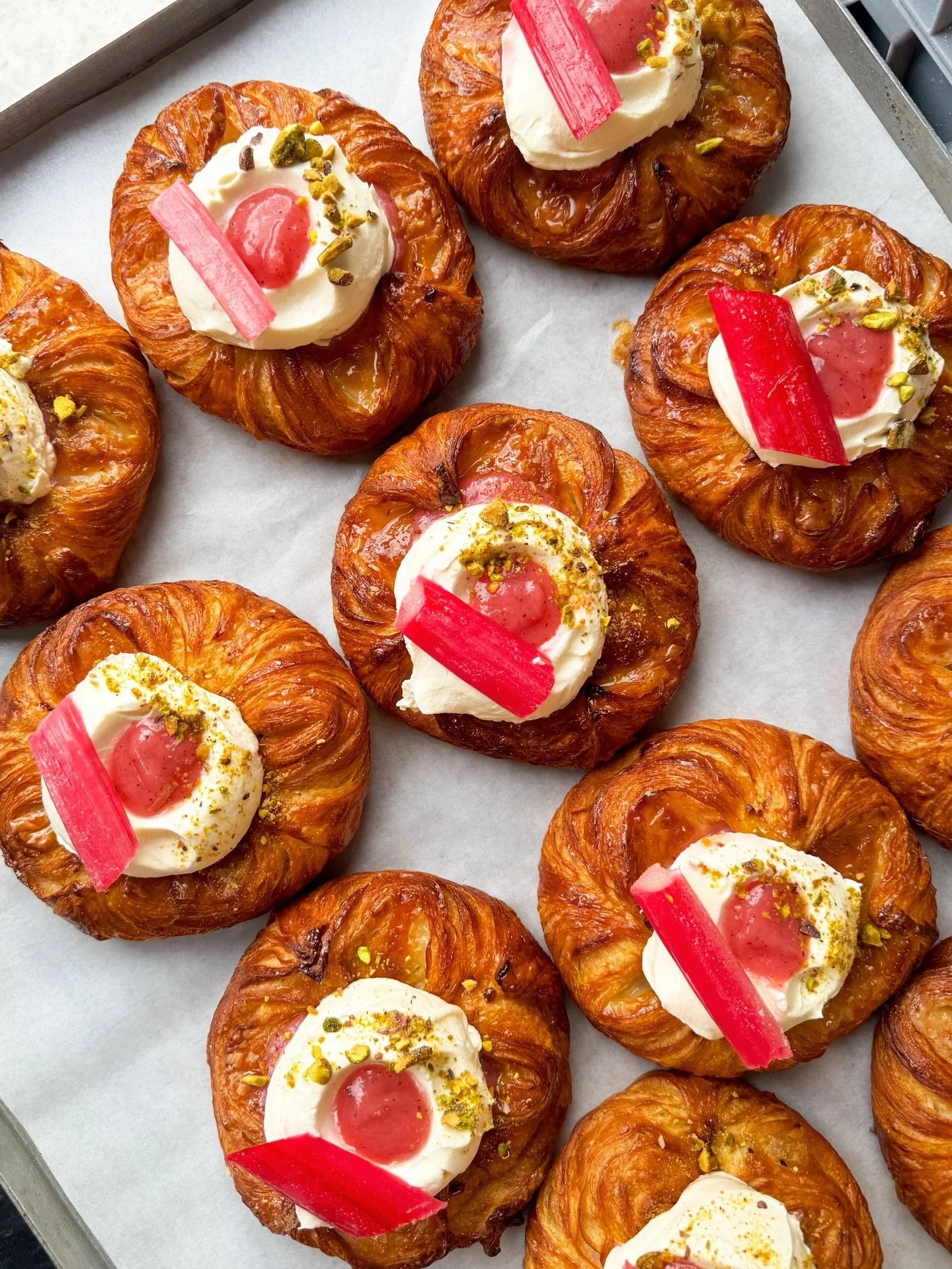 Meet our newest seasonal Danish ✨

Buttery pastry with pistachio cr&egrave;me p&acirc;tissi&egrave;re, topped with chantilly cream, forced rhubarb compote, poached rhubarb and crushed pistachios.

Currently available in London📍East Dulwich &amp; Wan
