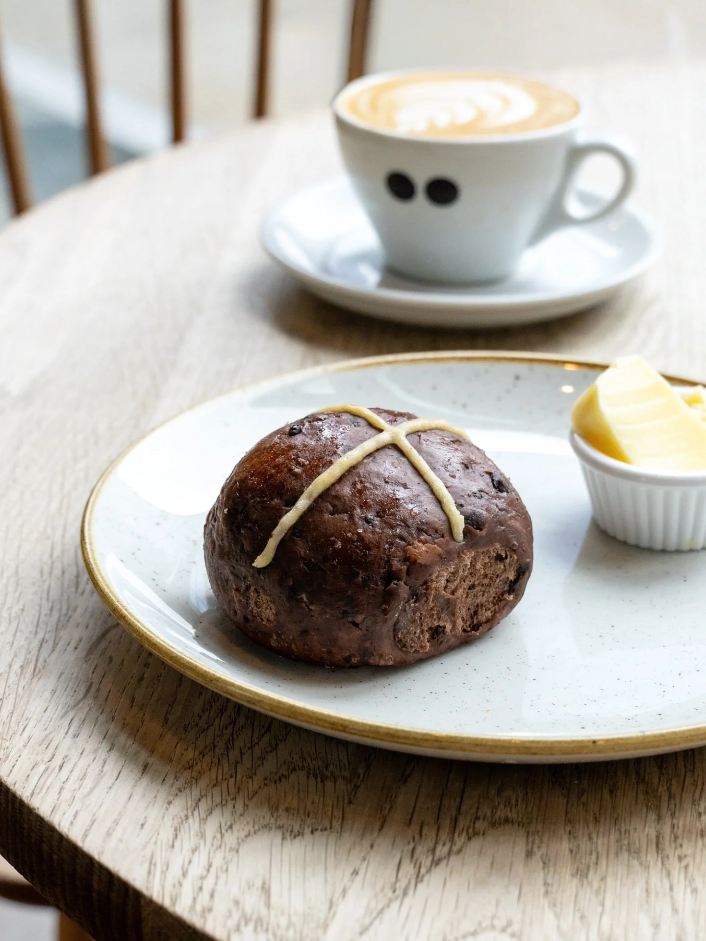 Good Friday calls for something special ✨
 Our Vegan Chocolate &amp; Cardamom Hot Cross Buns are here for the Easter weekend, best enjoyed with a really good coffee.

Available in all our bakeries until Monday 6 April.
 Don&rsquo;t miss them 💛