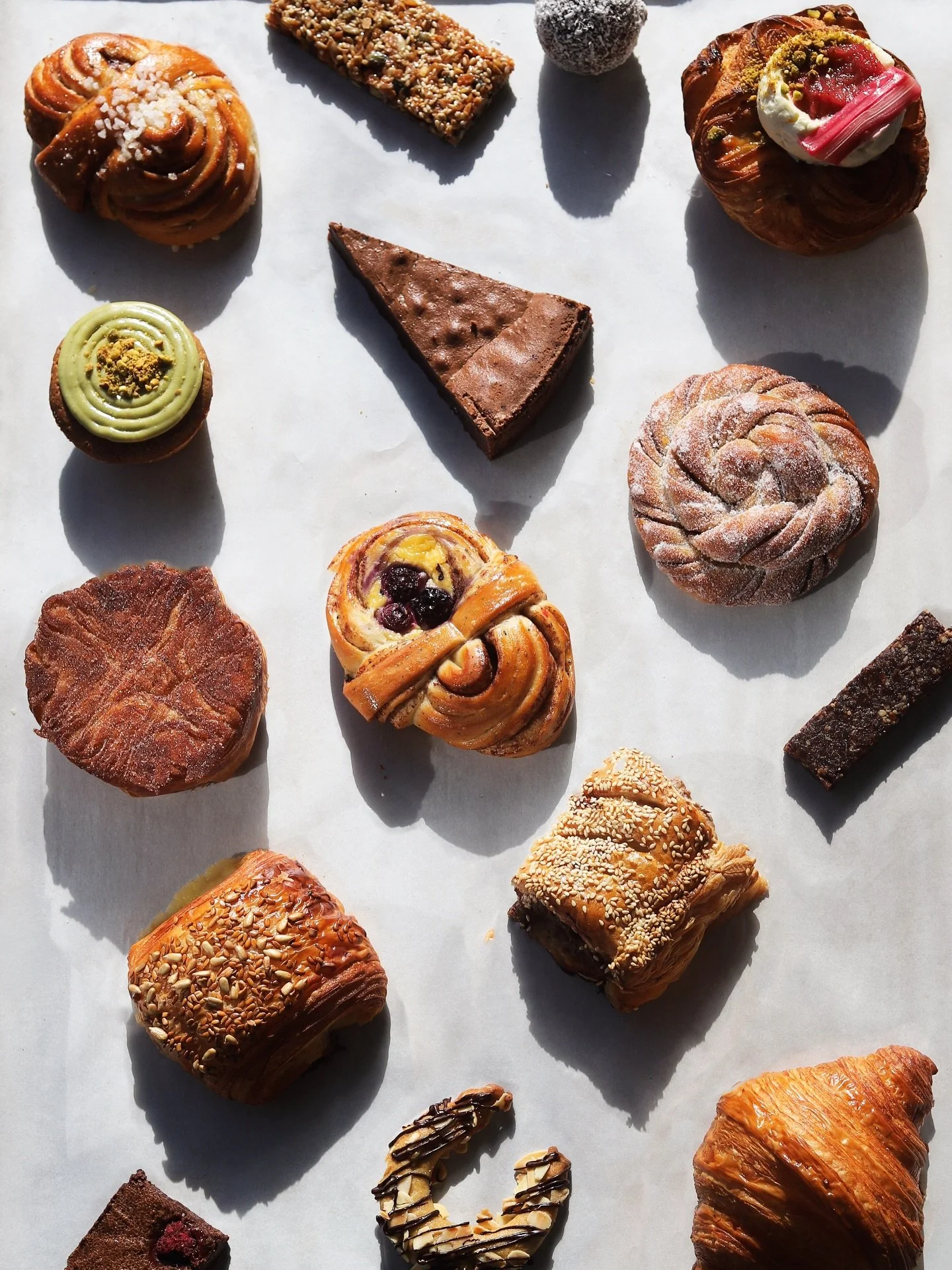 A little glimpse of what&rsquo;s on the counter right now.. 
&bull; Cinnamon bun, a S&ouml;derberg staple  &bull; Honey granola bar &bull; Chocolate ball with coffee &amp; desiccated coconut &bull; Rhubarb pastry with pistachio cr&egrave;me p&acirc;t