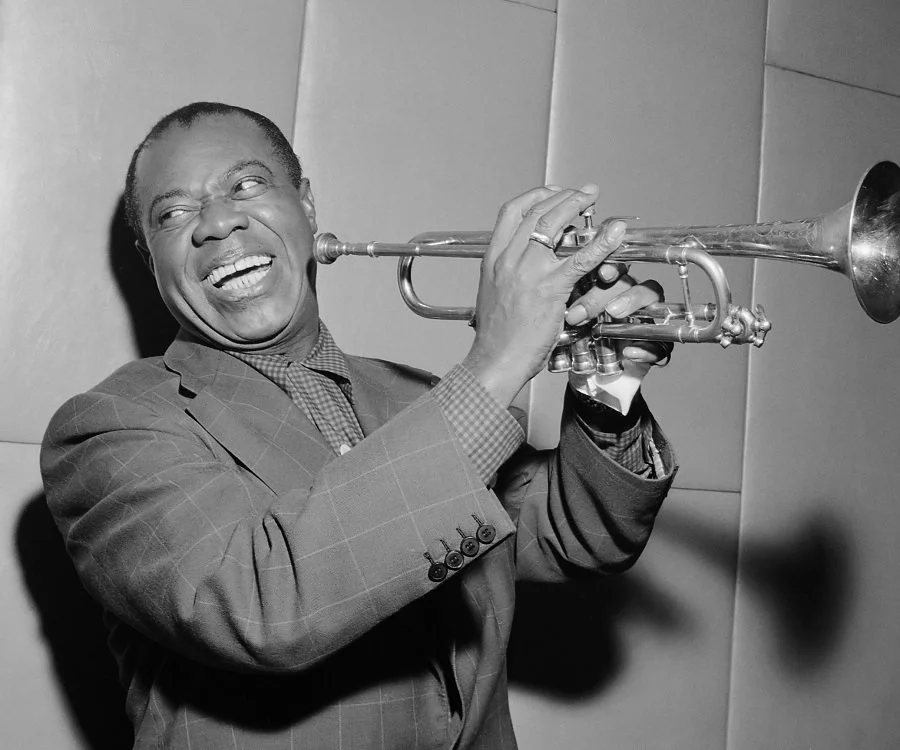 Louis Armstrong, ( via The Famous People )