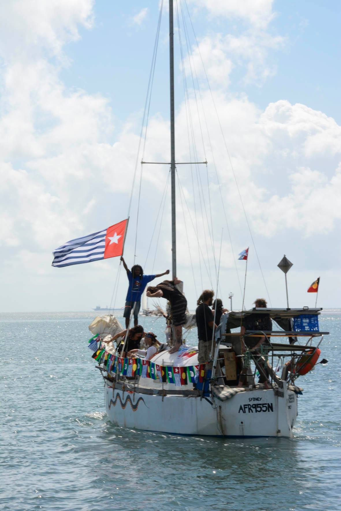 small West Papuan Boat floating off.jpg