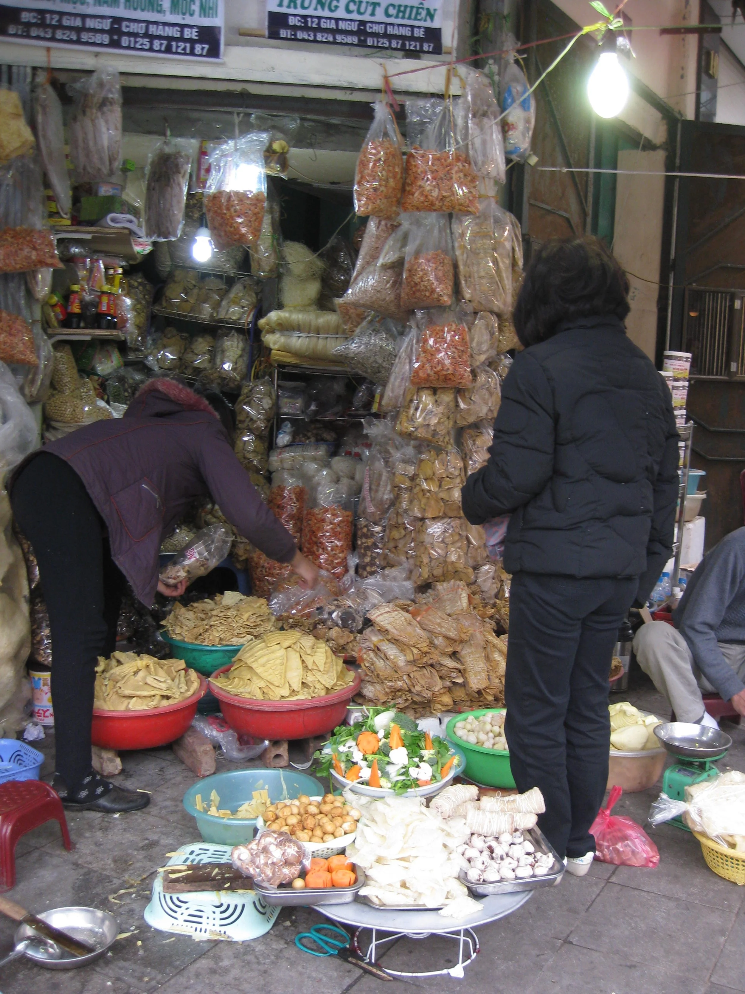 asahel's mum at shop.JPG