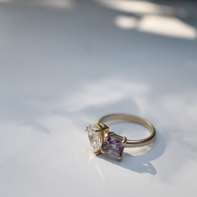 Custom work for M + J  with an heirloom diamond pear shaped diamond and a custom princess cut Rose de France colored Amethyst. All set in satin finished yellow gold.