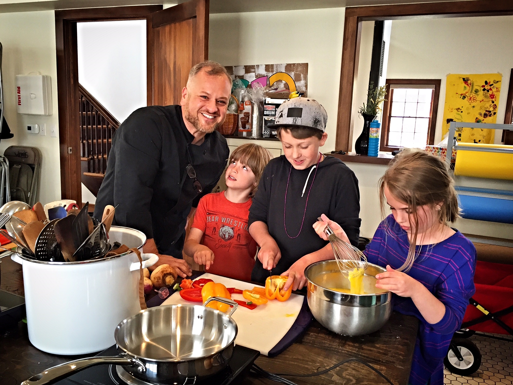 Scotty Irani, of In the Kitchen with Scotty , cooking with our 2016 Spring Break Urban Farm Campers. The campers created a full meal made with local, organic food for their parents on the last day of camp!