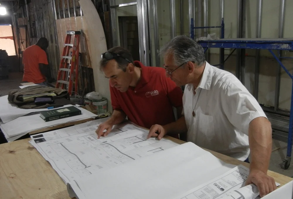 Consulting the plans for 221 West 79th Street.