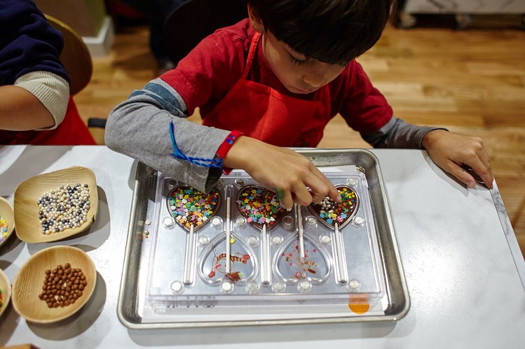 Hayden Chou Almeraz works on his creations. STEVE REMICH FOR THE WALL STREET JOURNAL