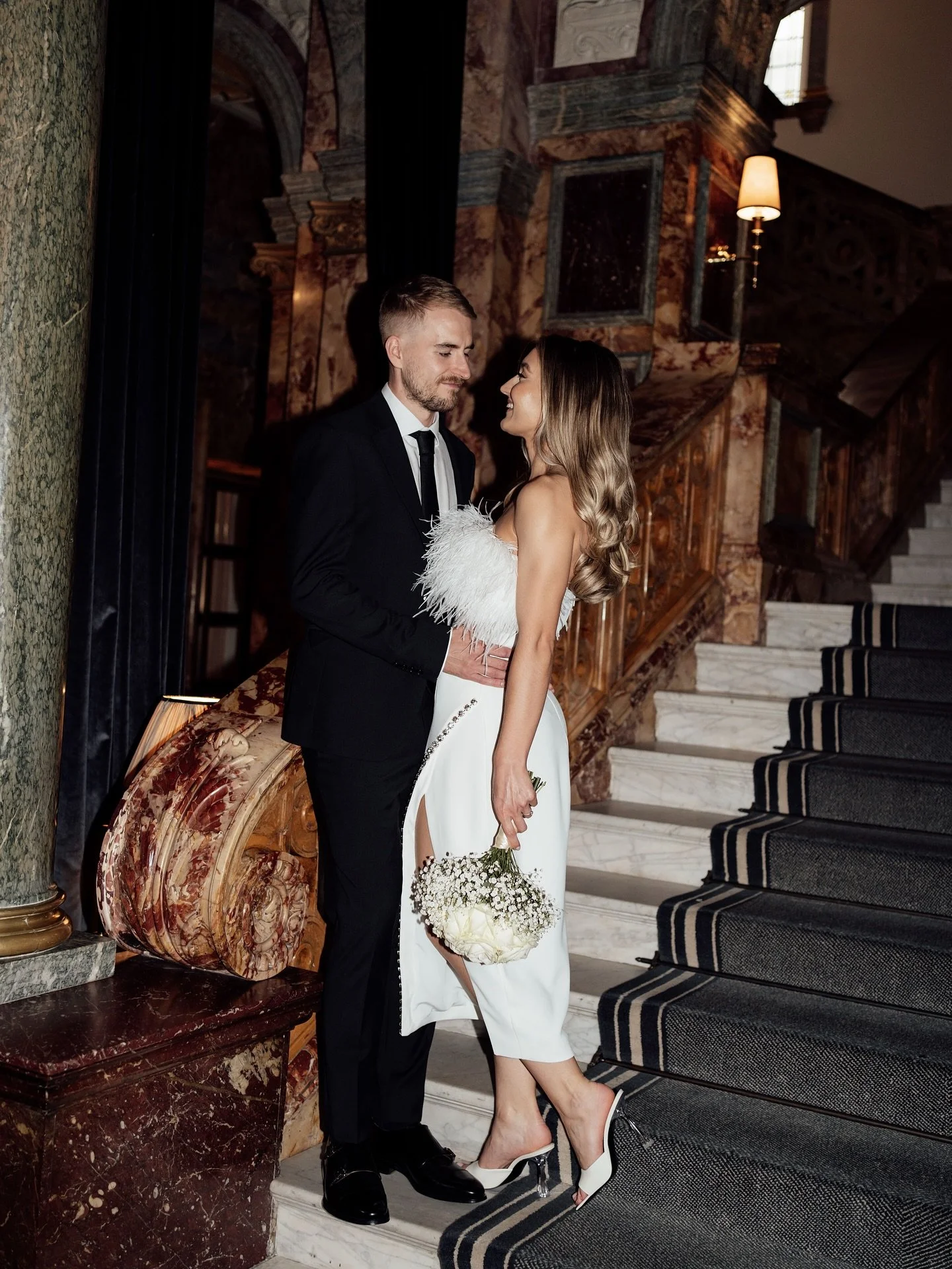 E &amp; G on the steps at the stunning Kimpton Fitzroy ahead of their intimate London wedding ceremony.

Venue @kimptonfitzroy 
Makeup @emmaseatreemakeup 
Flowers @pmflowersuk 
Dress @mrselfportrait 

#editorialwedding #londonwedding #citywedding #su