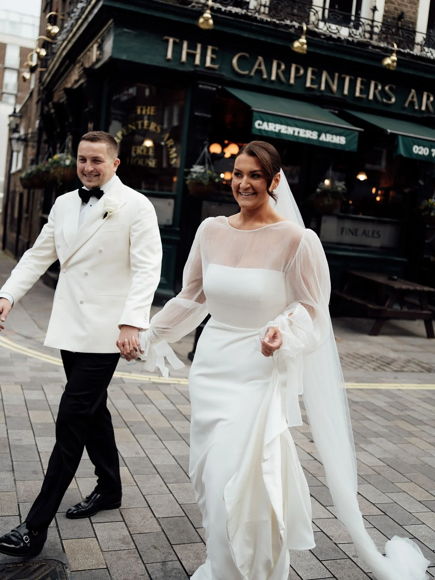 K&amp;C on their way to The Italian Greyhound after their Old Marylebone Town Hall wedding ceremony in London

Ceremony @adaytorememberlondon 
Reception @greyhoundmarylebone 
Florist @burtonsblooms 
Hair @carlywilliamshair 
Makeup @avriljarrettmua 
D