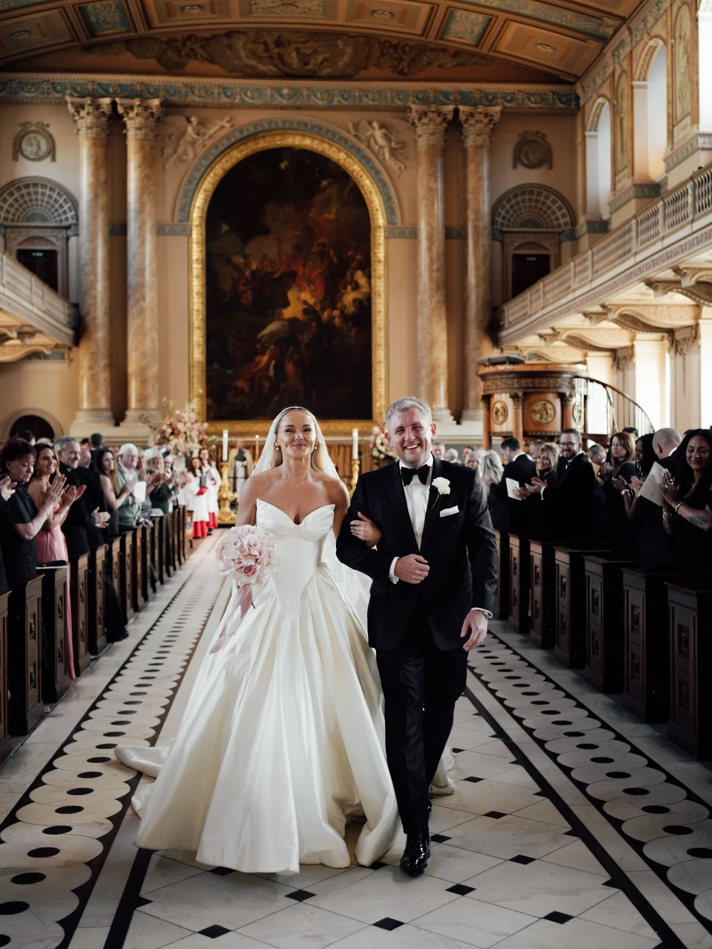 G&amp;A walking back up the aisle after their beautiful wedding ceremony at the Chapel of St Peter and St Paul, Greenwich Naval College in London.

Edited with our &lsquo;Classic&rsquo; Editorial Preset inside The Union of Two 2.0 Preset Pack for wed