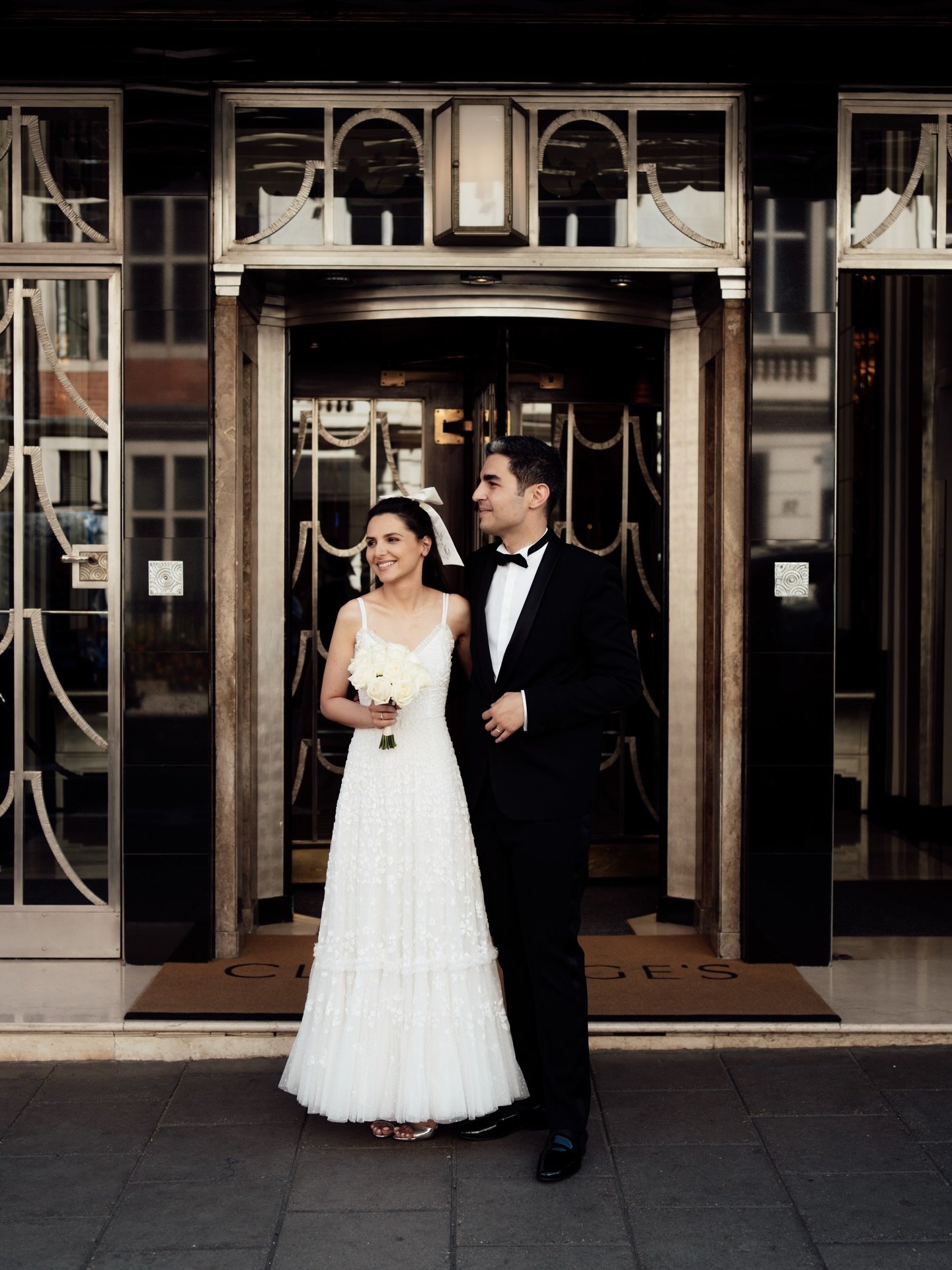 L &amp; L outside the amazing Claridge&rsquo;s Hotel after their gorgeous intimate London wedding.

Edited with the &lsquo;Classic&rsquo; editorial preset from the Union of Two 2.0 preset pack.

Dress @needleandthreadlondon 
Venue @claridgeshotel 
Ha