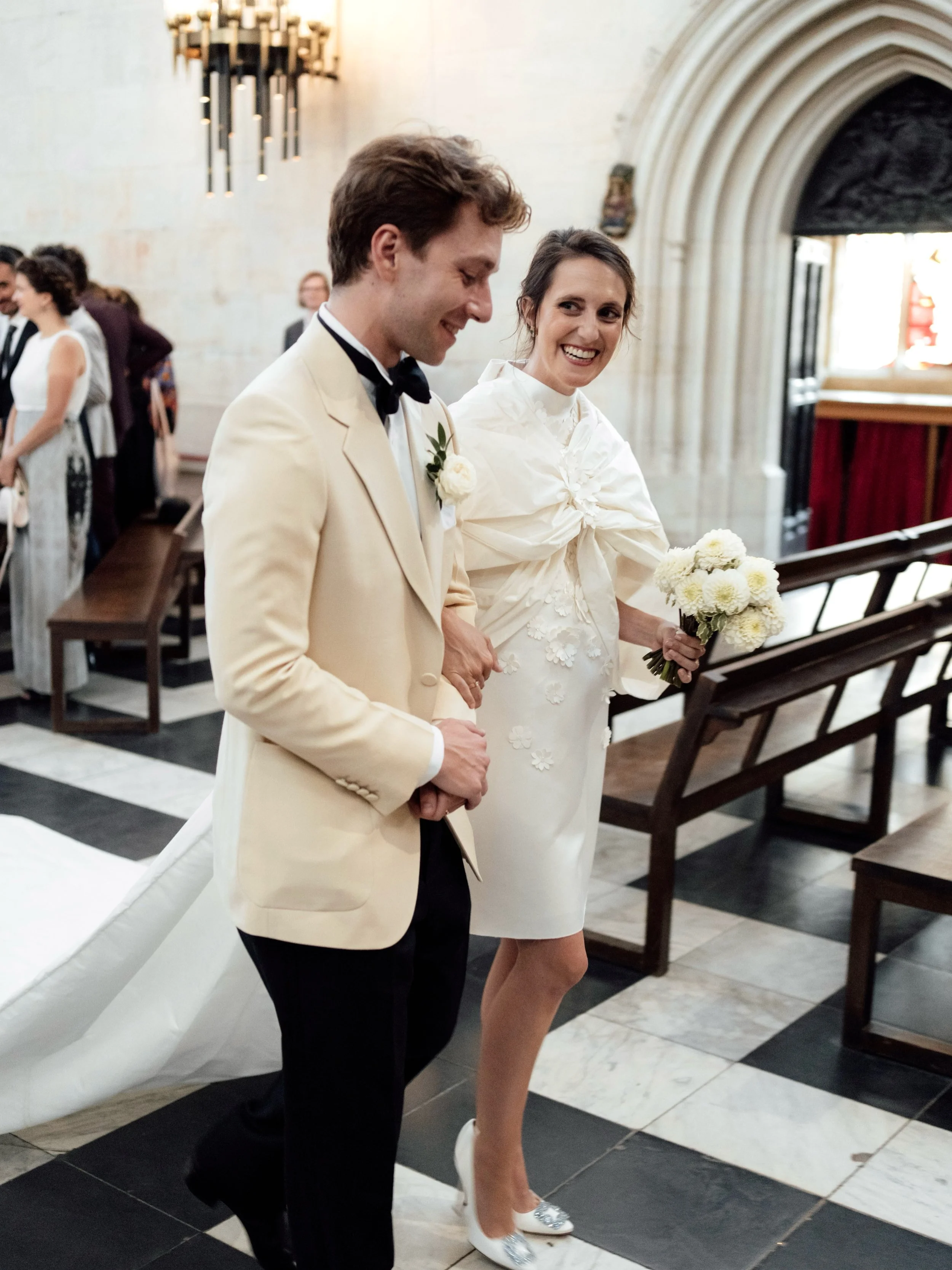 M &amp; A exiting their ceremony at the beautiful King&rsquo;s College Chapel in Cambridge.

Edited with our &lsquo;Soft&rsquo; editorial style preset from the Union of Two 2.0 Preset Pack for wedding photographers.

#editorialstyle #editorialwedding