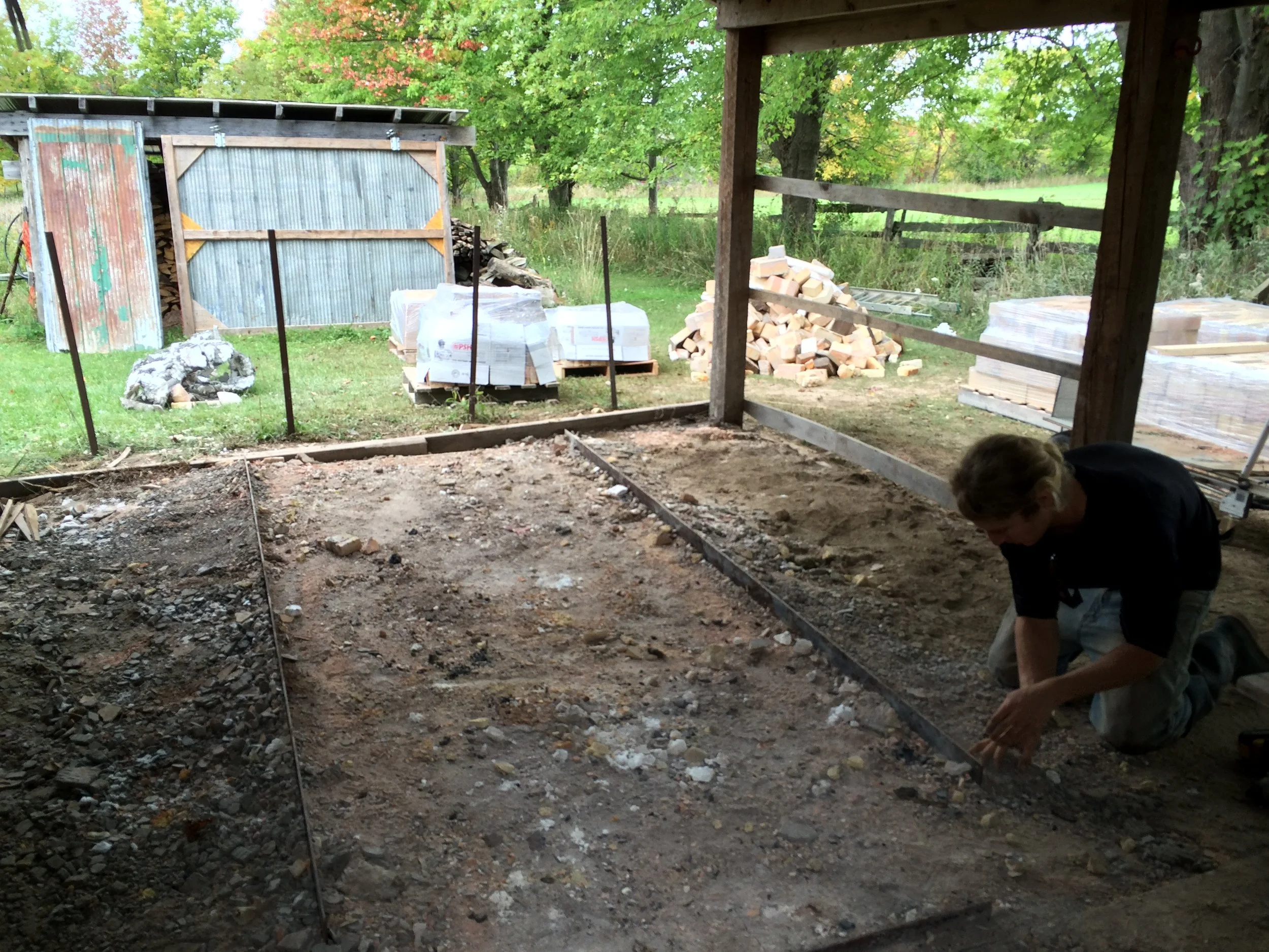 Step 7: Pull up the floor, and unbolt the steel frame from the ground. Note the pile of rubble in the background - a much smaller pile than we anticipated!