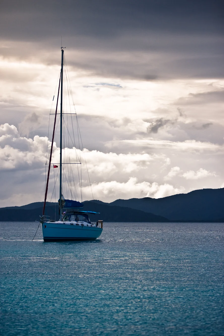 Anchored sailboat.