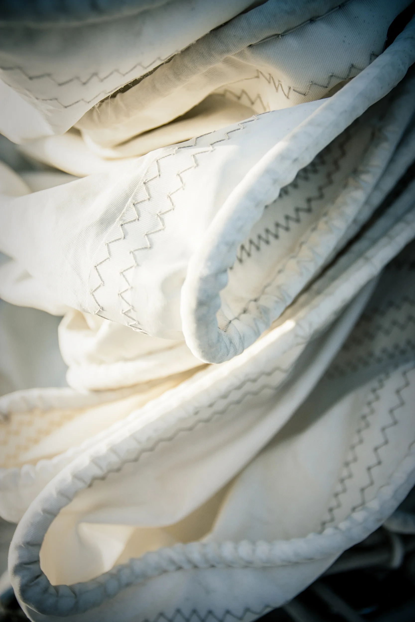 Detailed image of the ruffles of a sail.