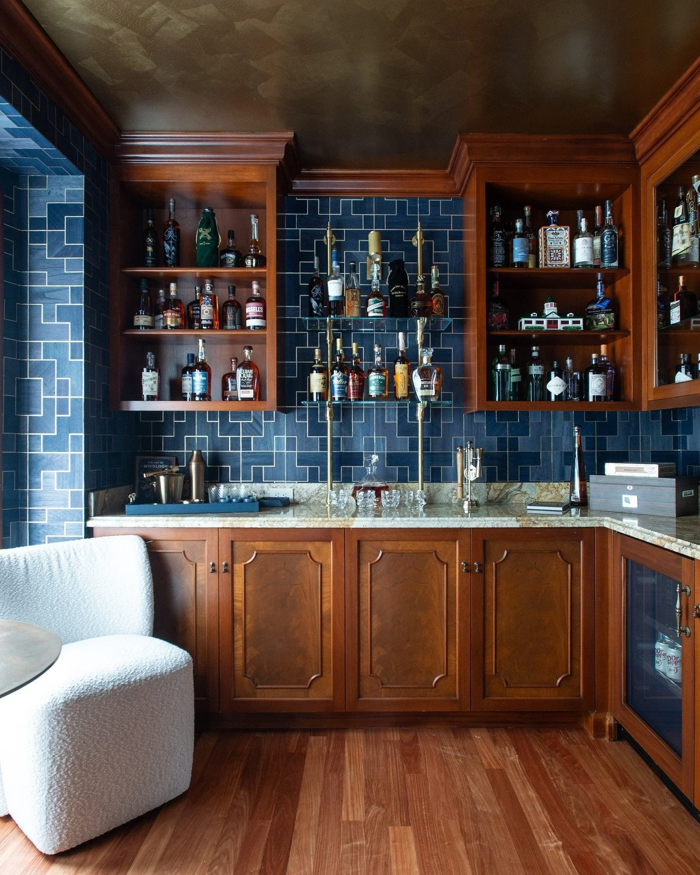 Imagine discovering a hidden room behind a bookcase&hellip;

What was once a secret space has been transformed into a one-of-a-kind bar area. This home, originally designed and built by our team, has been given new life by its current owners, who rei