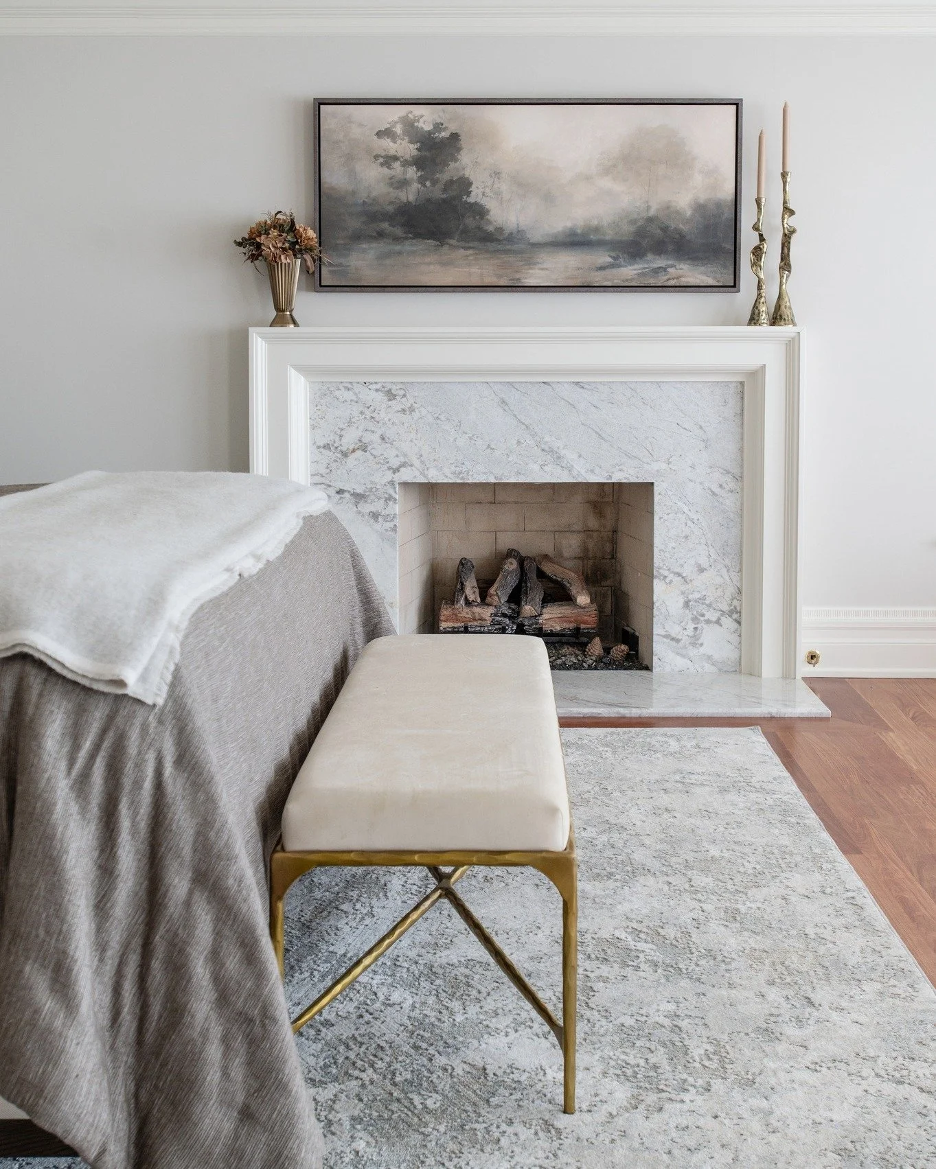 Sometimes the most powerful transformations are the quiet ones. 

This bedroom remodel centered around creating a simple, elegant fireplace that feels timeless and refined. Clean lines, soft neutral tones, and natural stone come together to create a 
