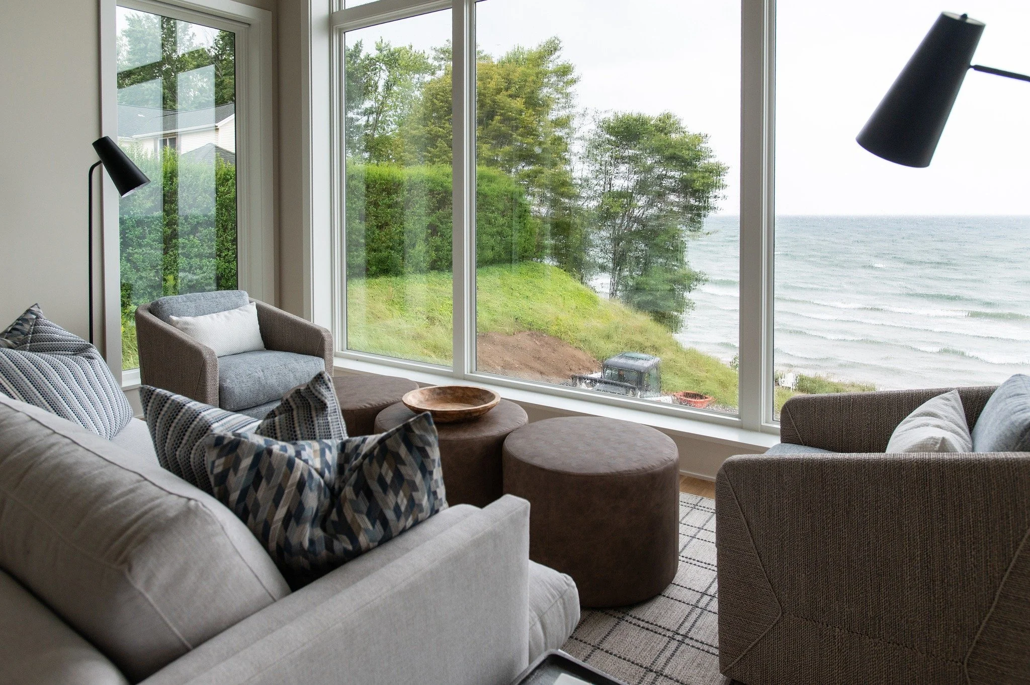Not every day of lake living is filled with sunshine, and that&rsquo;s part of the beauty. 

Designed for the quieter moments, this space invites you to slow down, settle in, and take in the view of Lake Michigan from the comfort of a cozy seat.

Bec