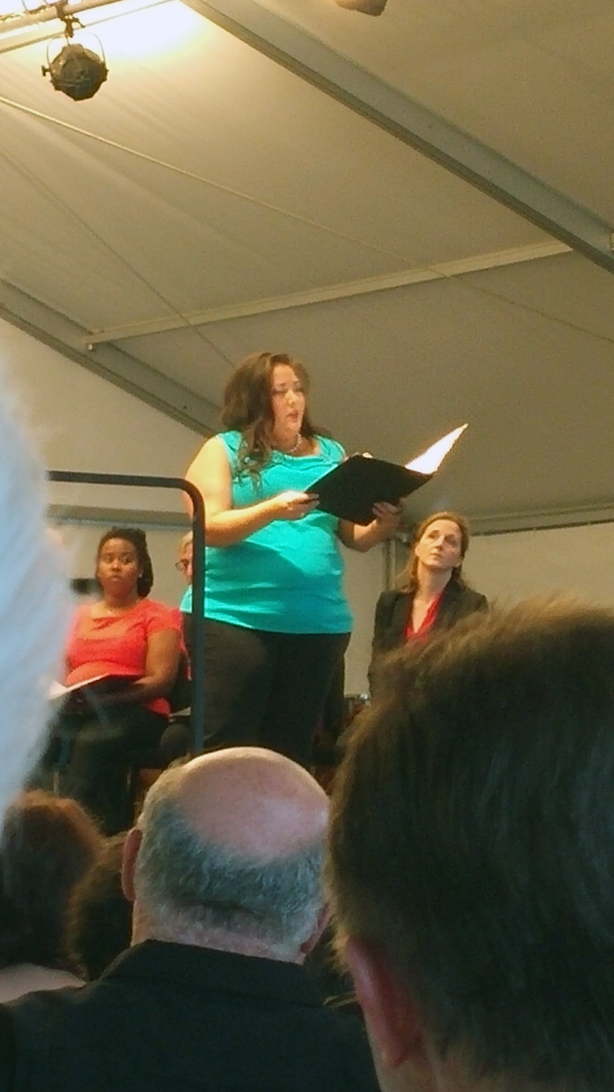 Soprano Gabrielle Bergeret removes the feather boa to sing the "Crucifixus" of Rossini's epic mass. (Right at this moment a storm passed over.) Photo credit: John Taylor