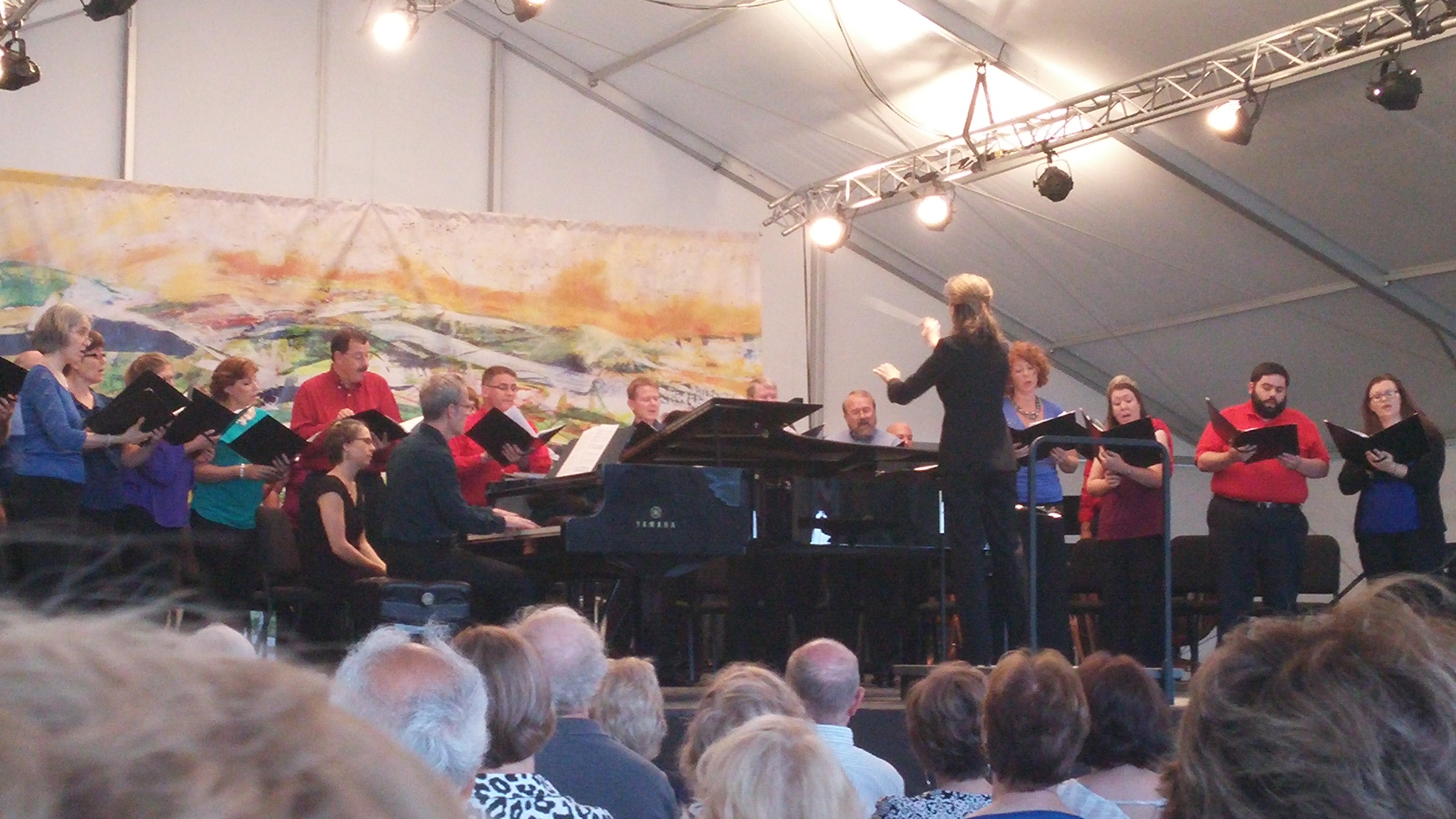 And the epic mass is under way. Erin Freeman leads the chorus through motets, fugues, and operatic moments in Rossini's Petite Messe Solennelle. Photo credit: John Taylor