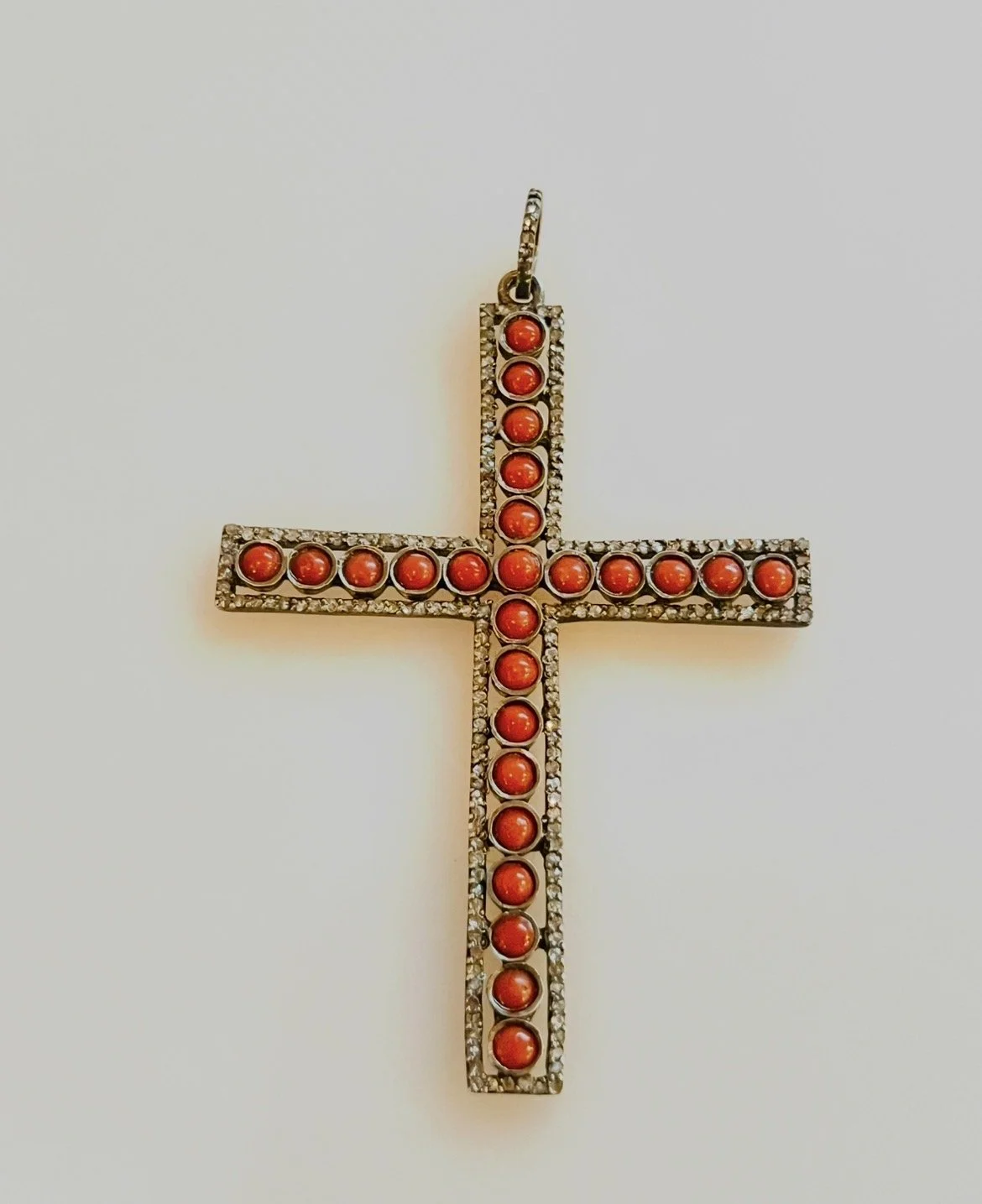 Coral and diamond cross