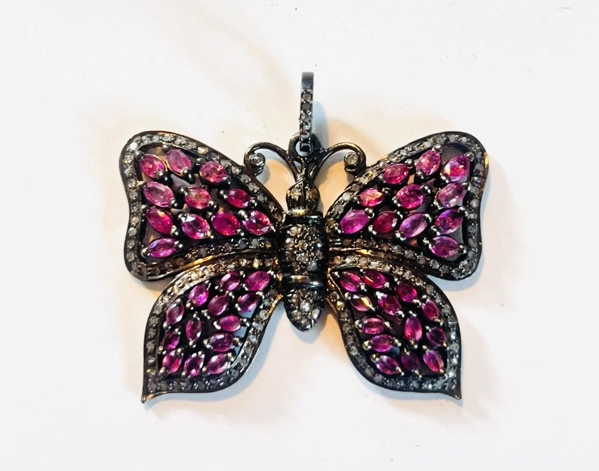 Pink sapphire and diamond butterfly