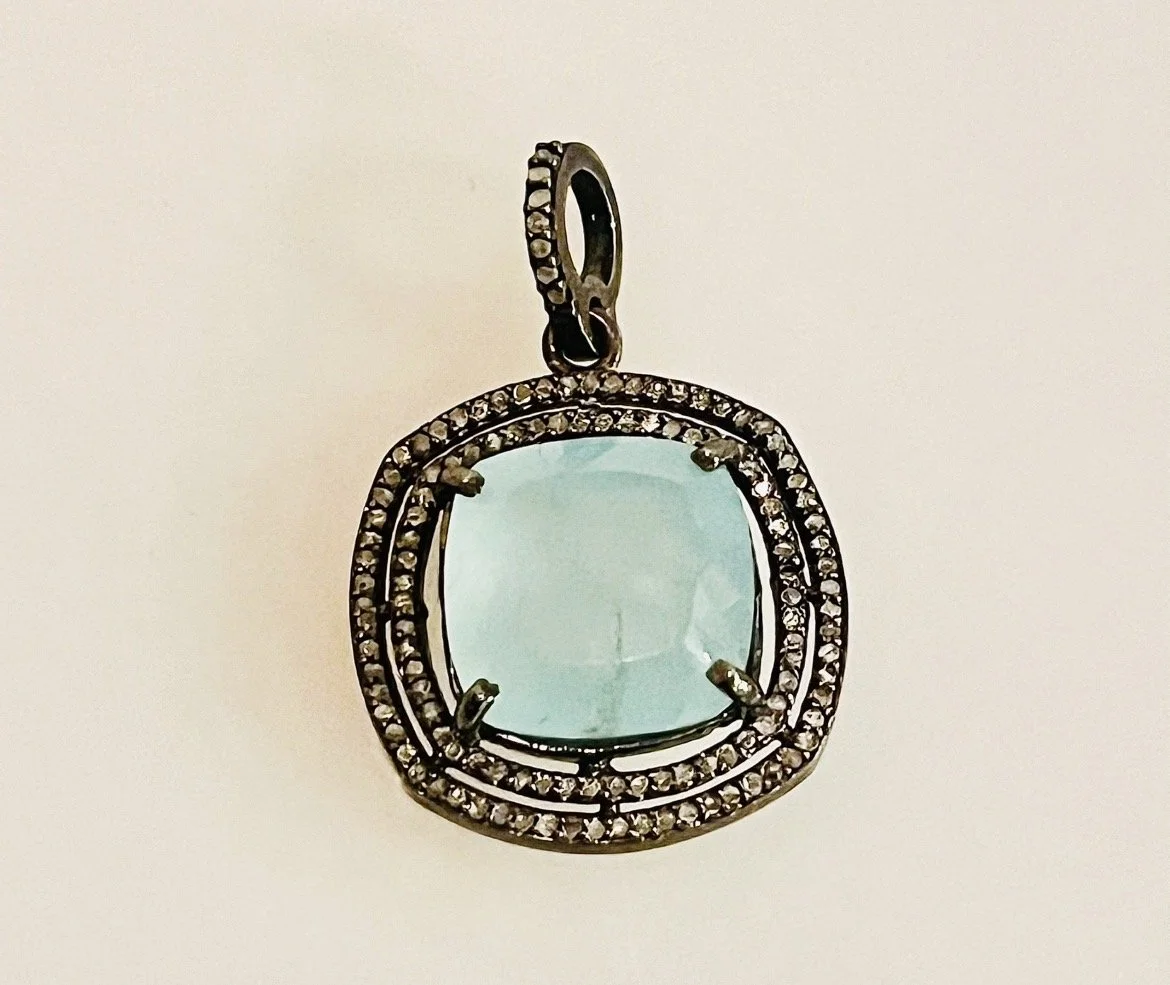 Aquamarine and diamond pendant