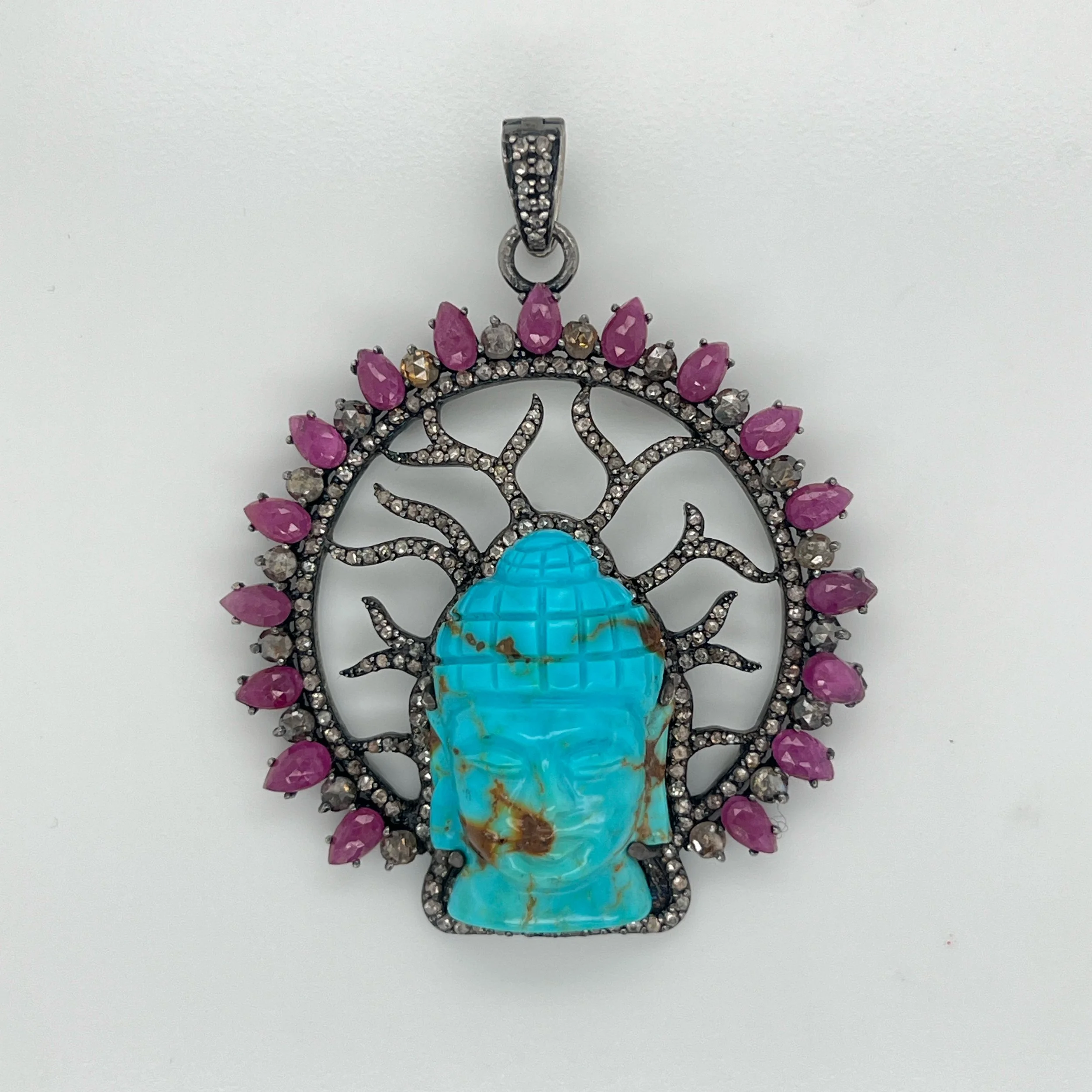 Turquoise and ruby Buddha