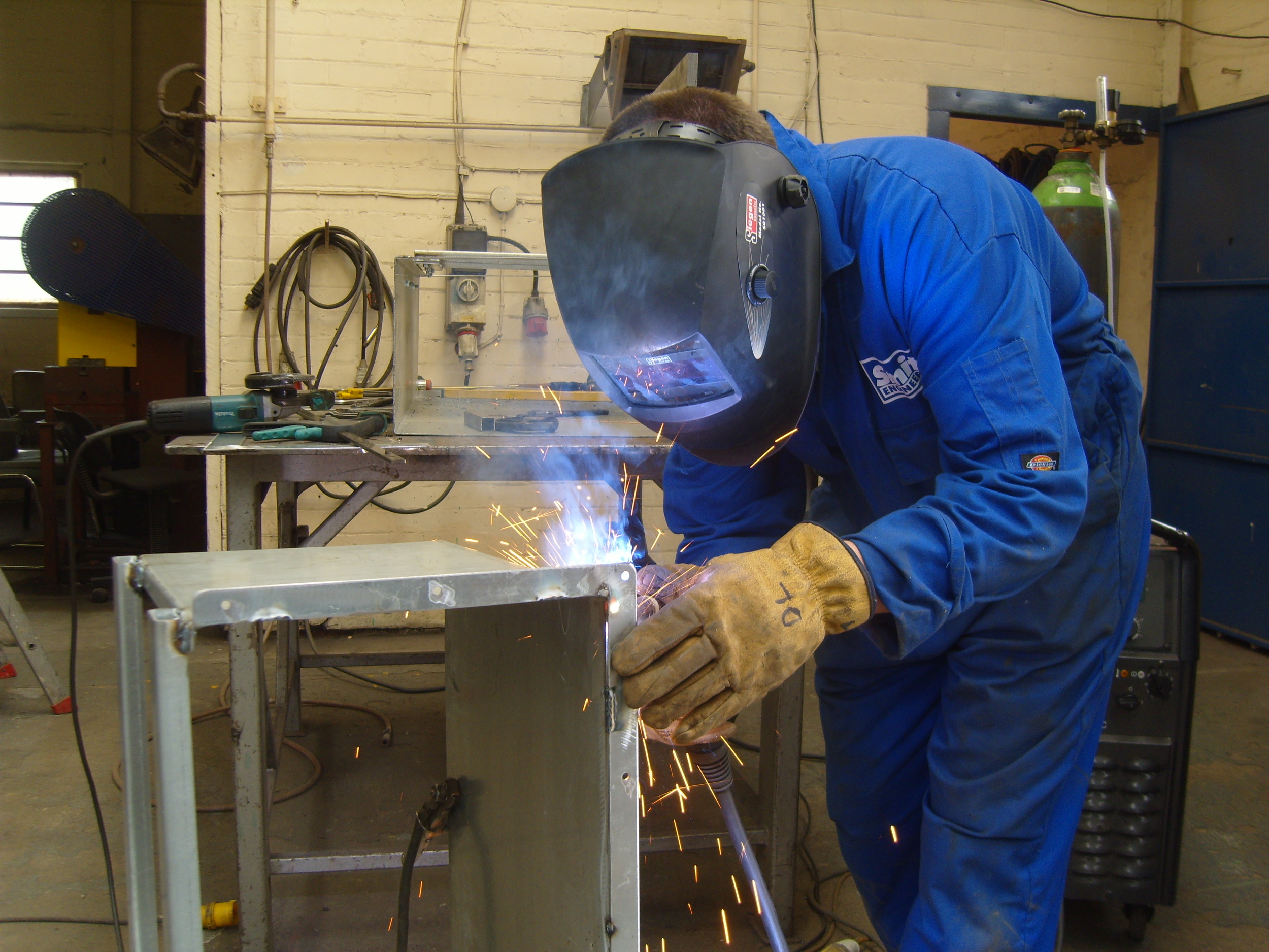  David Lightfoot welds the adjustable launder 