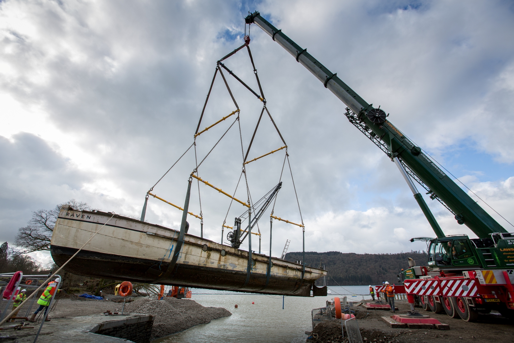 Carefully lifting Raven out of Lake Windermere. Image: Lakeland Arts