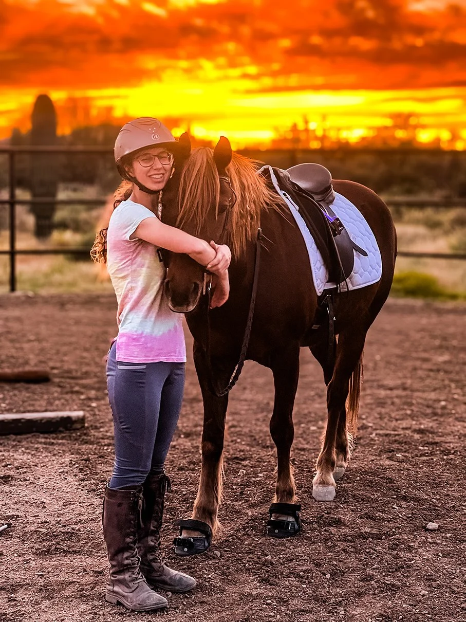 Equestrian Designer Maria DeCerce Hugging Horse Ketchup at Sunset in Arizona