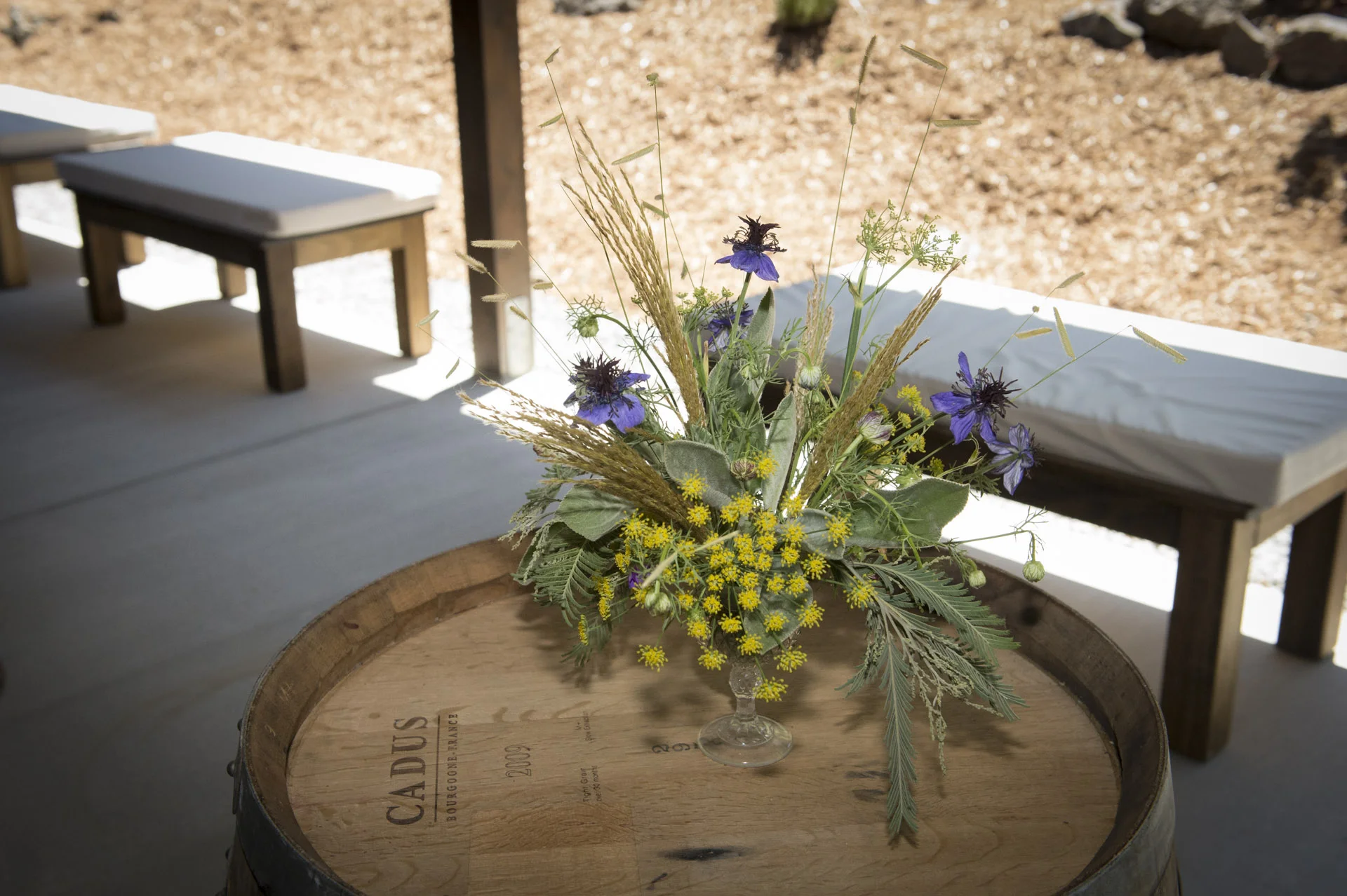 Wine Barrel with Flowers on the Breezeway: Image by The Highlands Estate