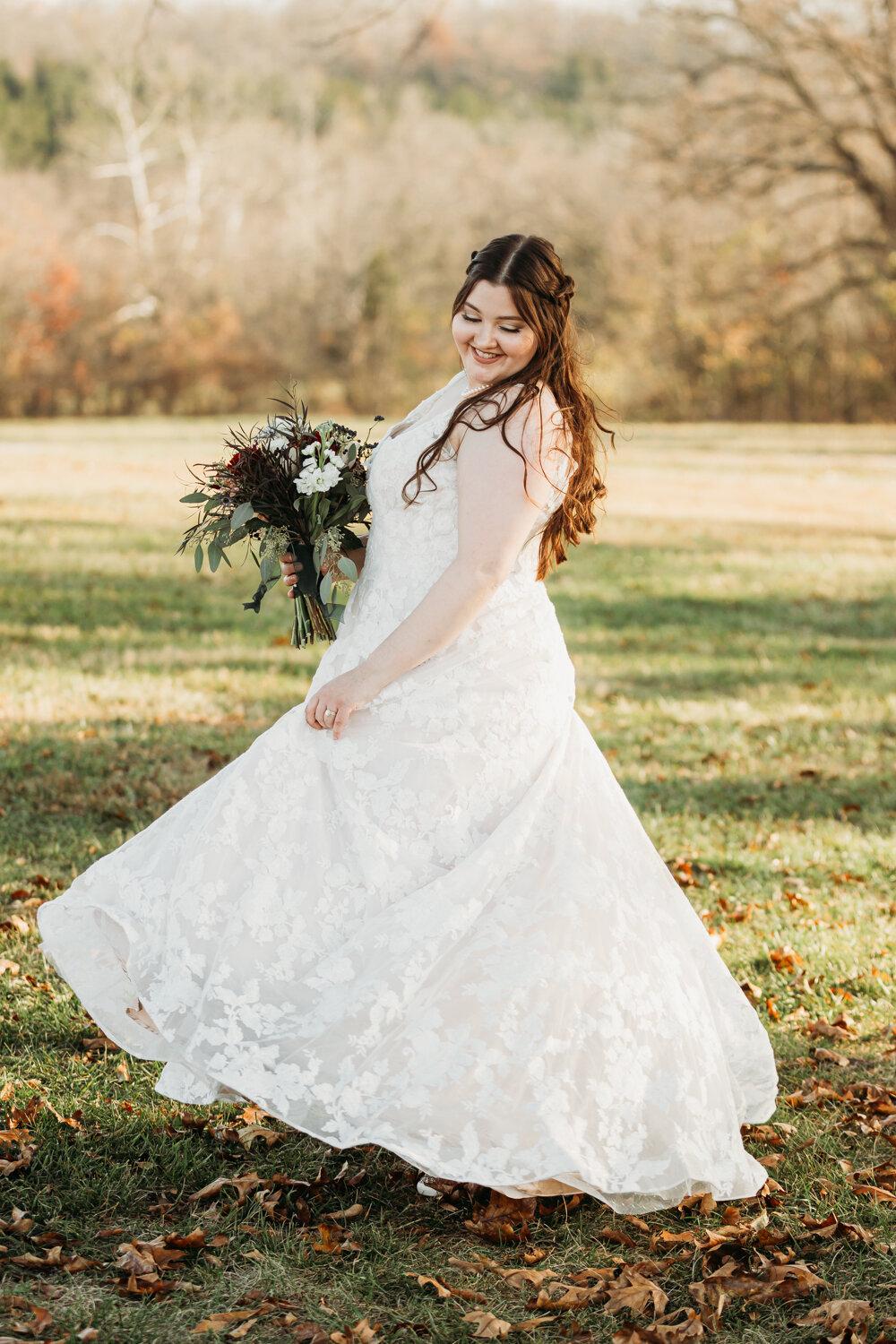 bride-smiling-swishing-dress-bolivar-mo-elopment-1.jpg