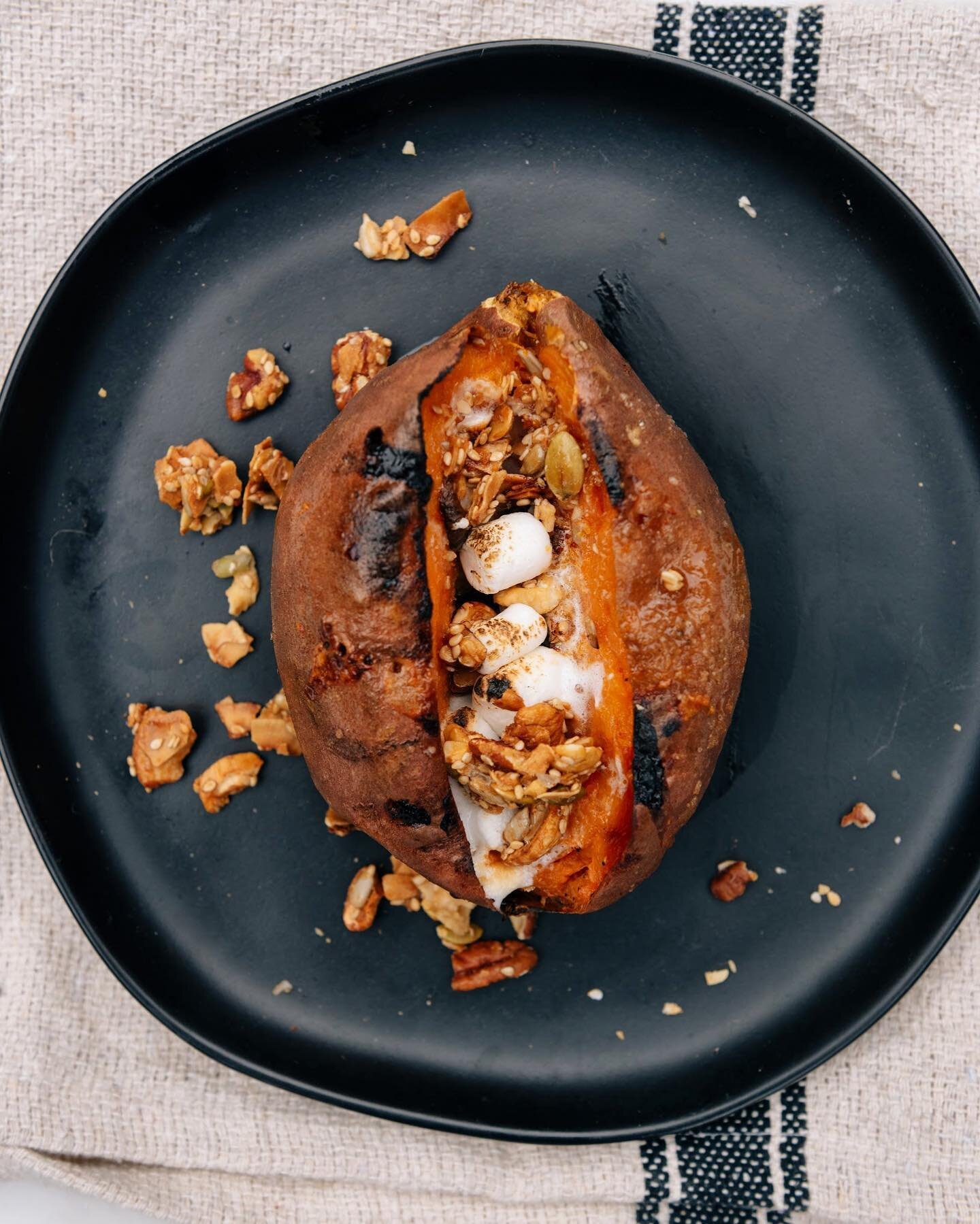 Who needs turkey when you have a stuffed sweet potato. Skip the sweet potato casserole this year and served individual sweet potatoes baked &amp; stuffed with marshmallows. Top it off with some crispy granola for some sweet crunch. @grandyoats #cocon