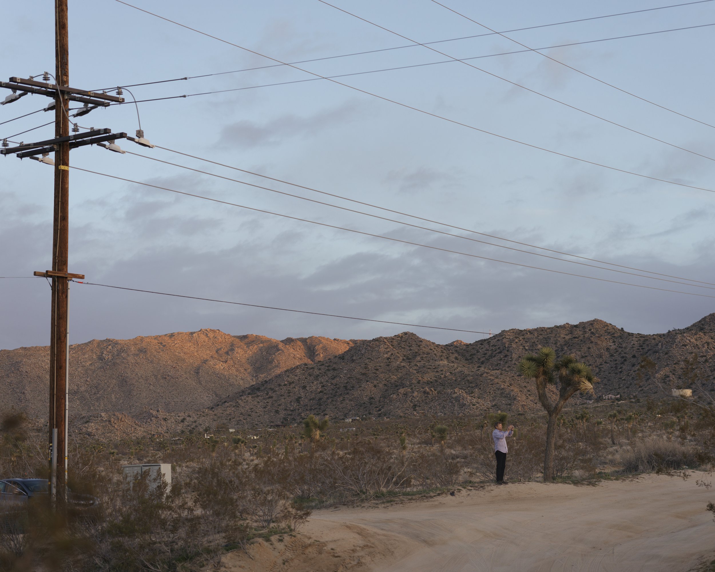 A Man Taking a Photo at Sunset.jpg